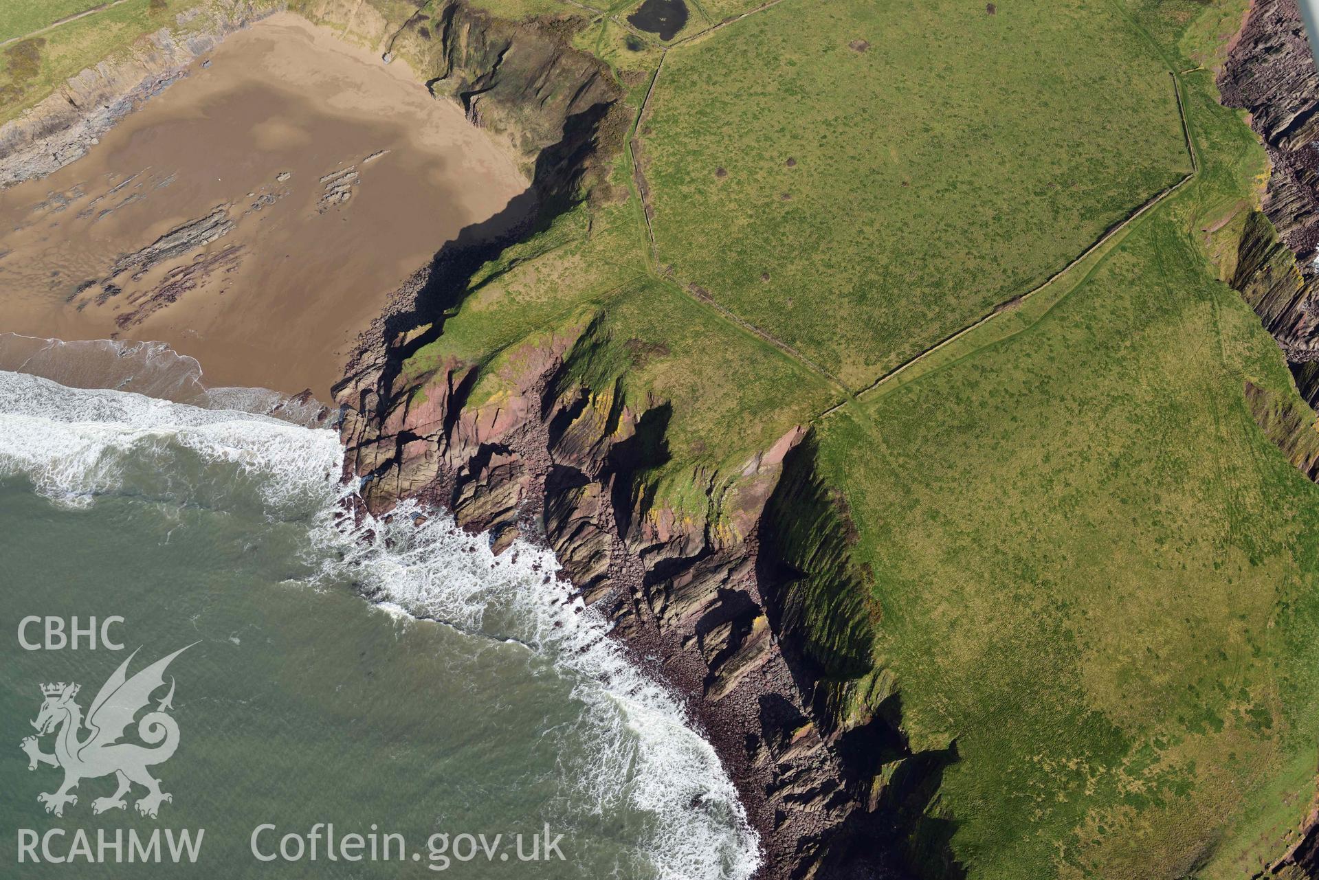 RCAHMW colour oblique aerial photograph of Caldey Island, view of West Beacon barrow taken on 4 March 2022 by Toby Driver ((SS132096)