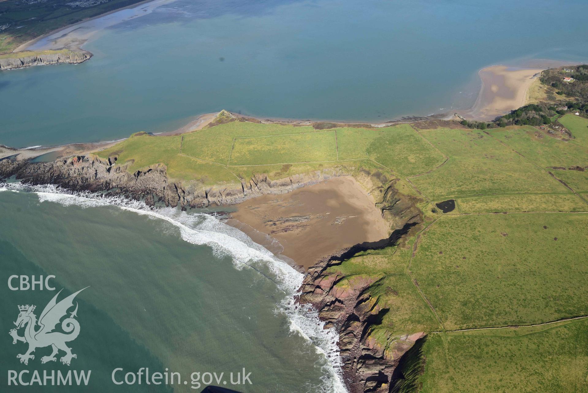 RCAHMW colour oblique aerial photograph of Caldey Island, Sandtop Bay from S taken on 4 March 2022 by Toby Driver ((SS131966)