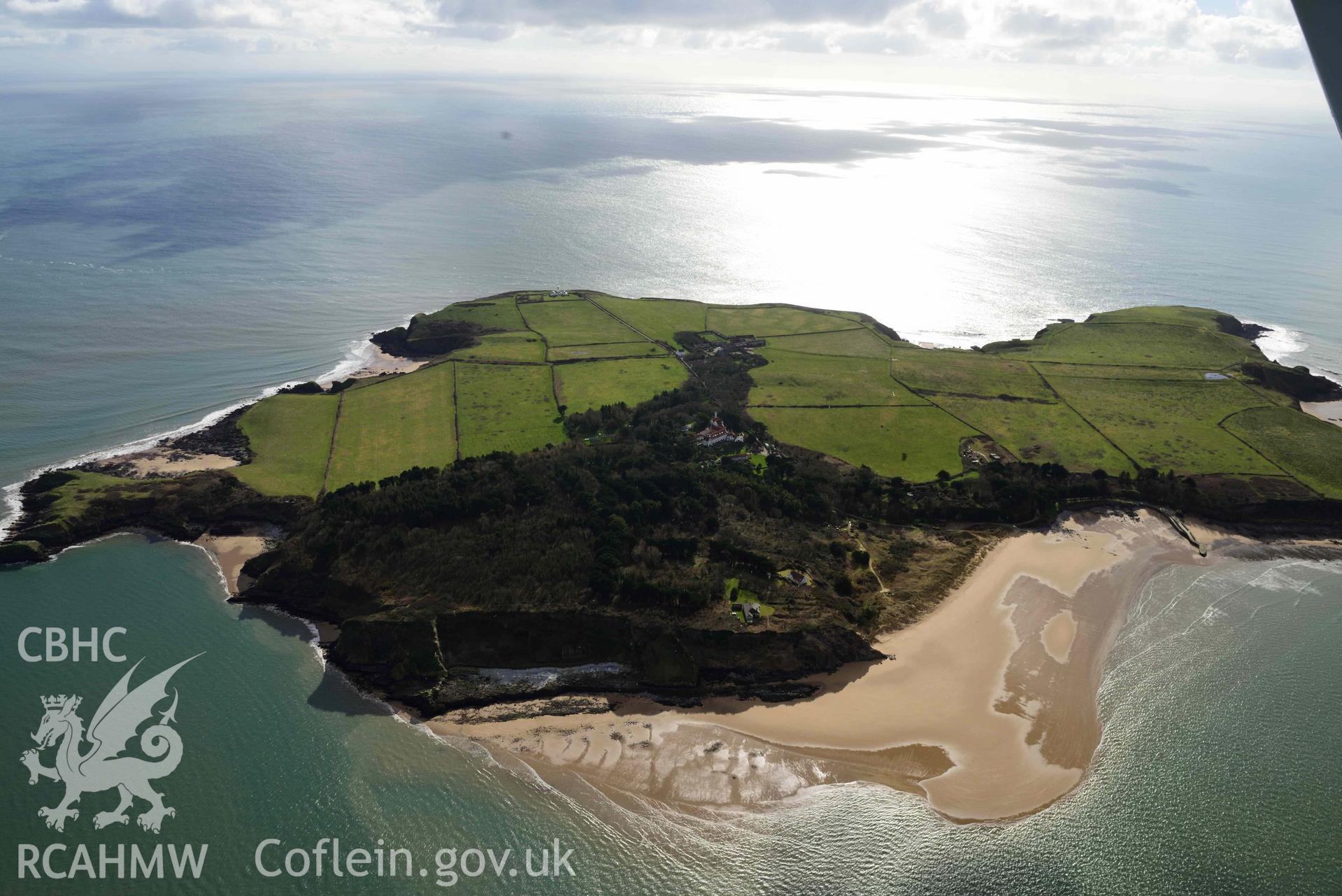 RCAHMW colour oblique aerial photograph of Caldey Island, landscape from the north taken on 4 March 2022 by Toby Driver ((SS141967)