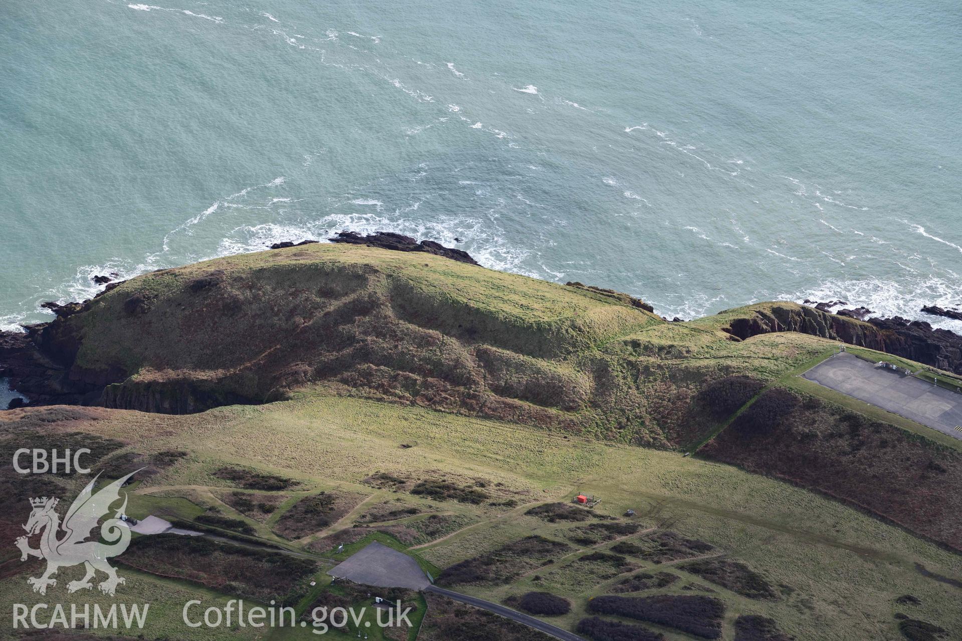 RCAHMW colour oblique aerial photograph of Old Castle Head promontory fort taken on 4 March 2022 by Toby Driver ((SS075966)