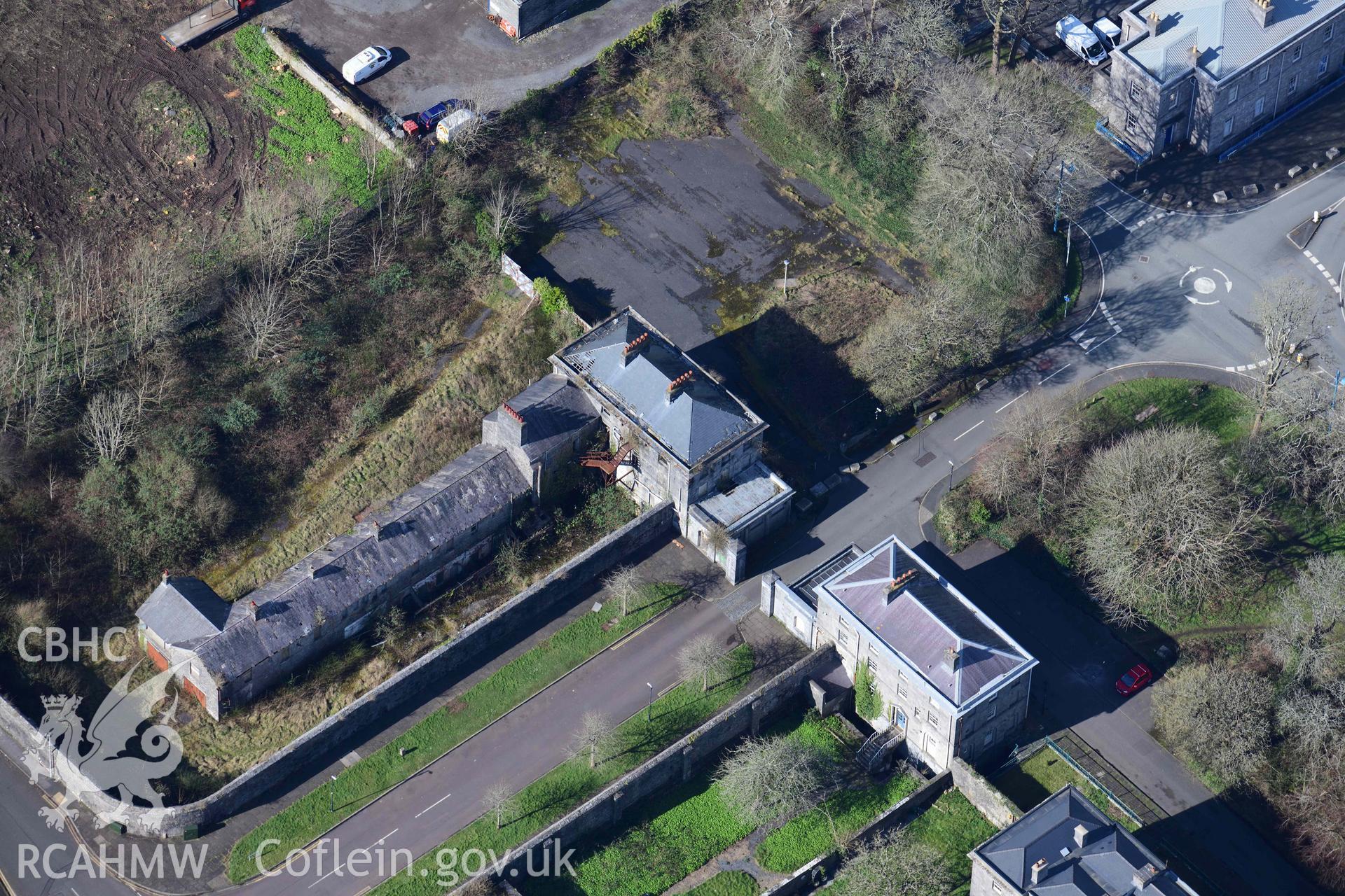 RCAHMW colour oblique aerial photograph of Pembroke Dockyard, dockyard gates taken on 4 March 2022 by Toby Driver ((SM960035)