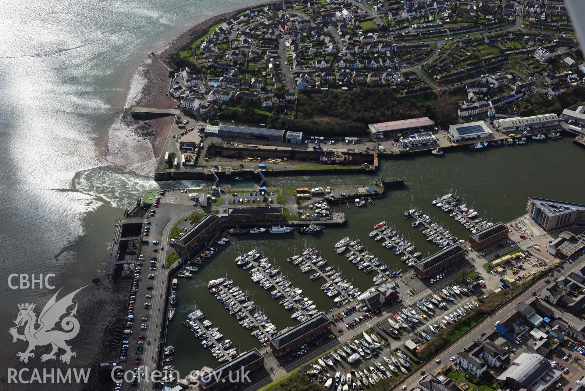 RCAHMW colour oblique aerial photograph of Milford Haven Docks taken on 4 March 2022 by Toby Driver ((SM901057)