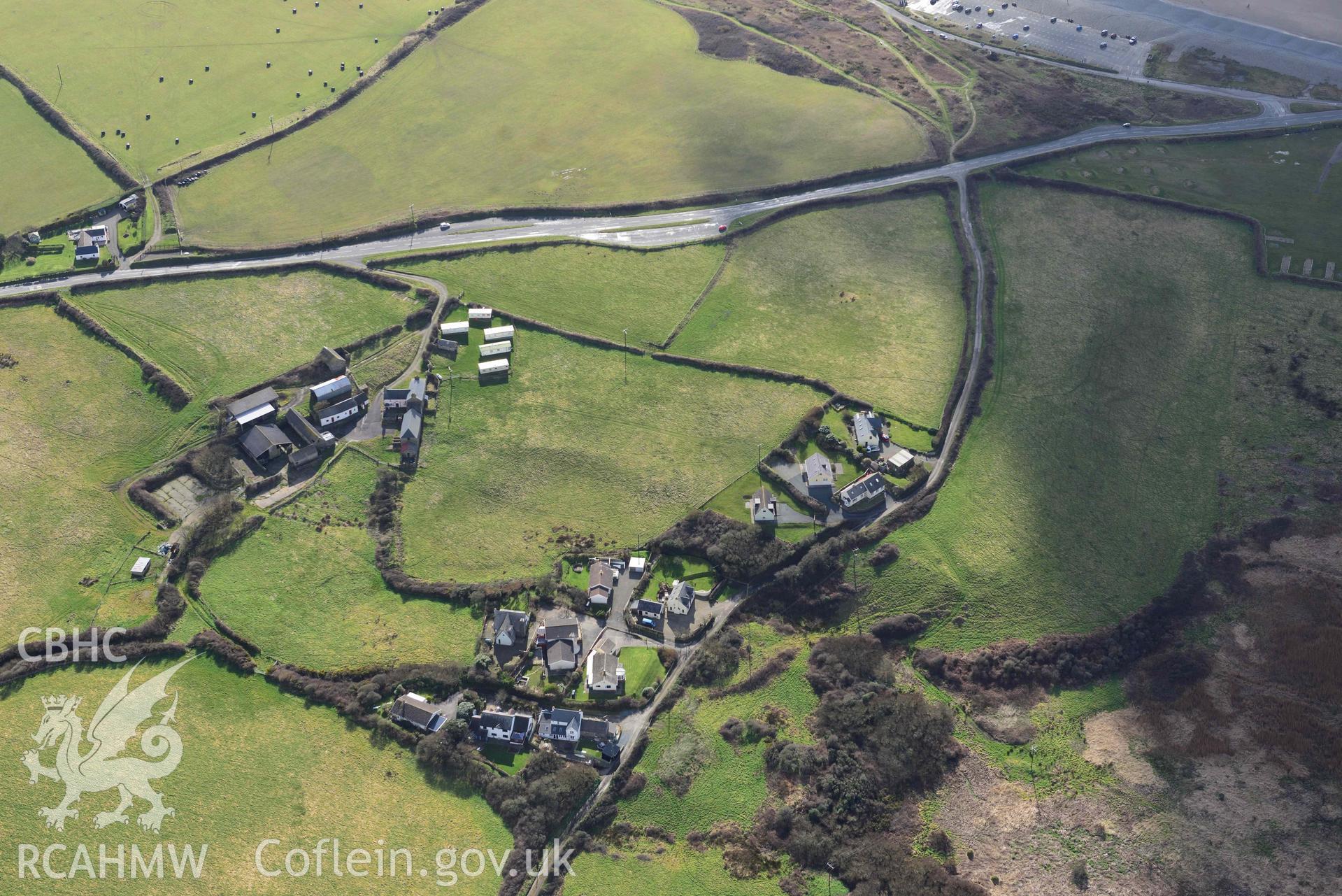 RCAHMW colour oblique aerial photograph of Wood Farm possible Roman site, earthwork taken on 4 March 2022 by Toby Driver ((SM852219)
