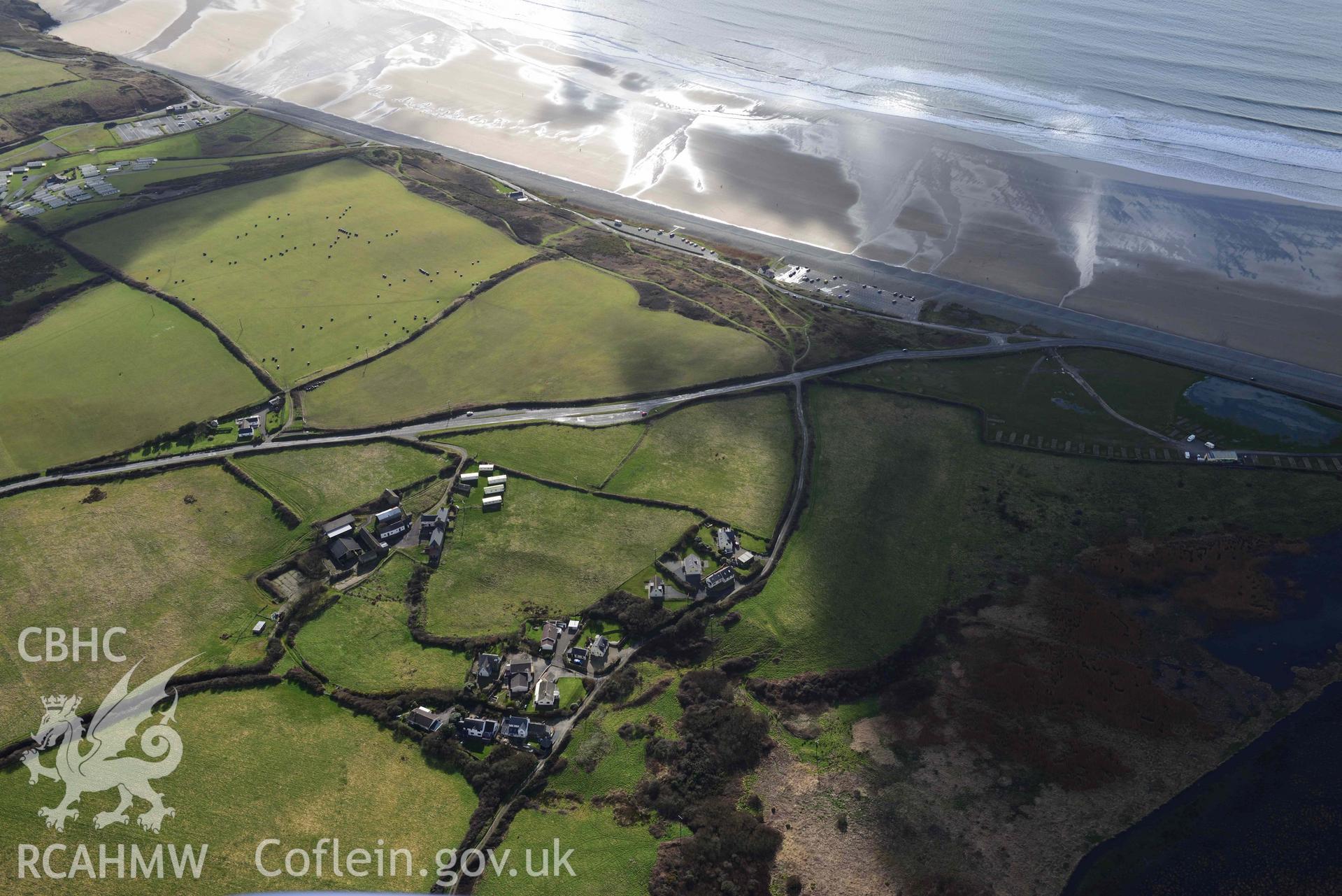 RCAHMW colour oblique aerial photograph of Wood Farm possible Roman site, earthwork taken on 4 March 2022 by Toby Driver ((SM852219)