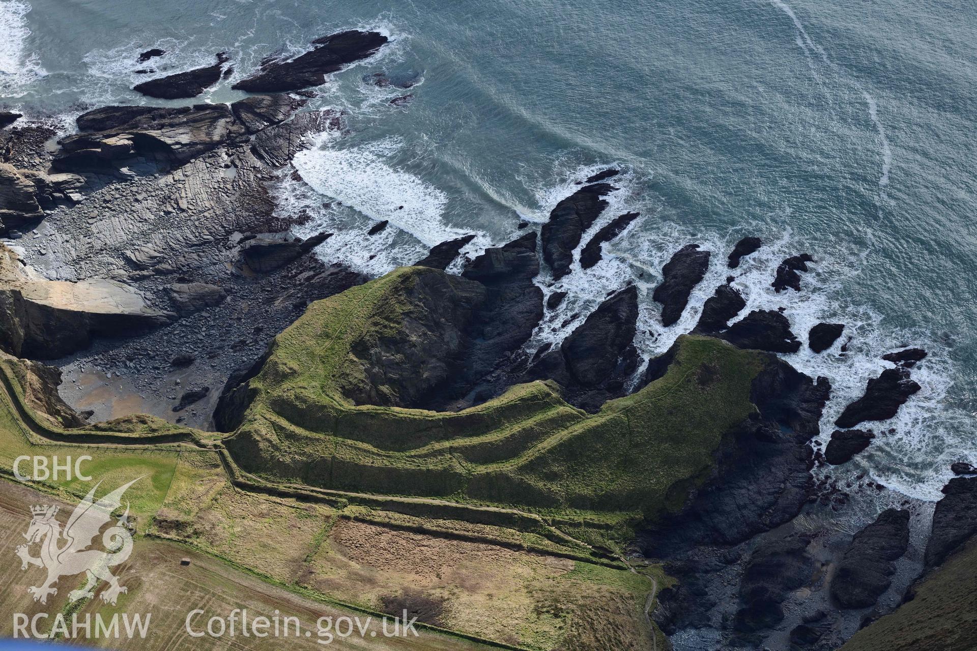 RCAHMW colour oblique aerial photograph of Porth y Rhaw promontory fort taken on 4 March 2022 by Toby Driver ((SM786242)