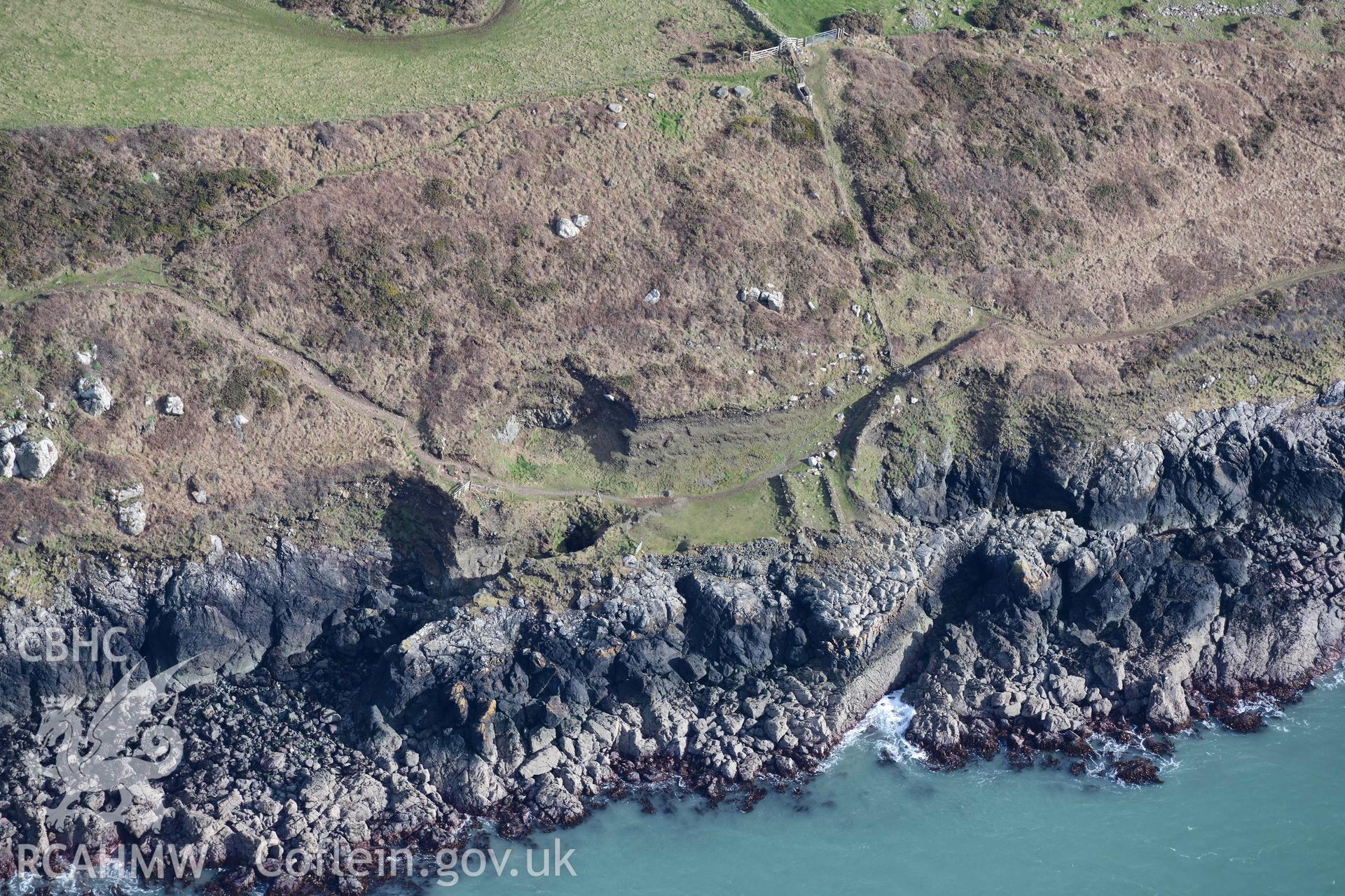 RCAHMW colour oblique aerial photograph of Penmaenmelyn copper mine taken on 4 March 2022 by Toby Driver ((SM715236)