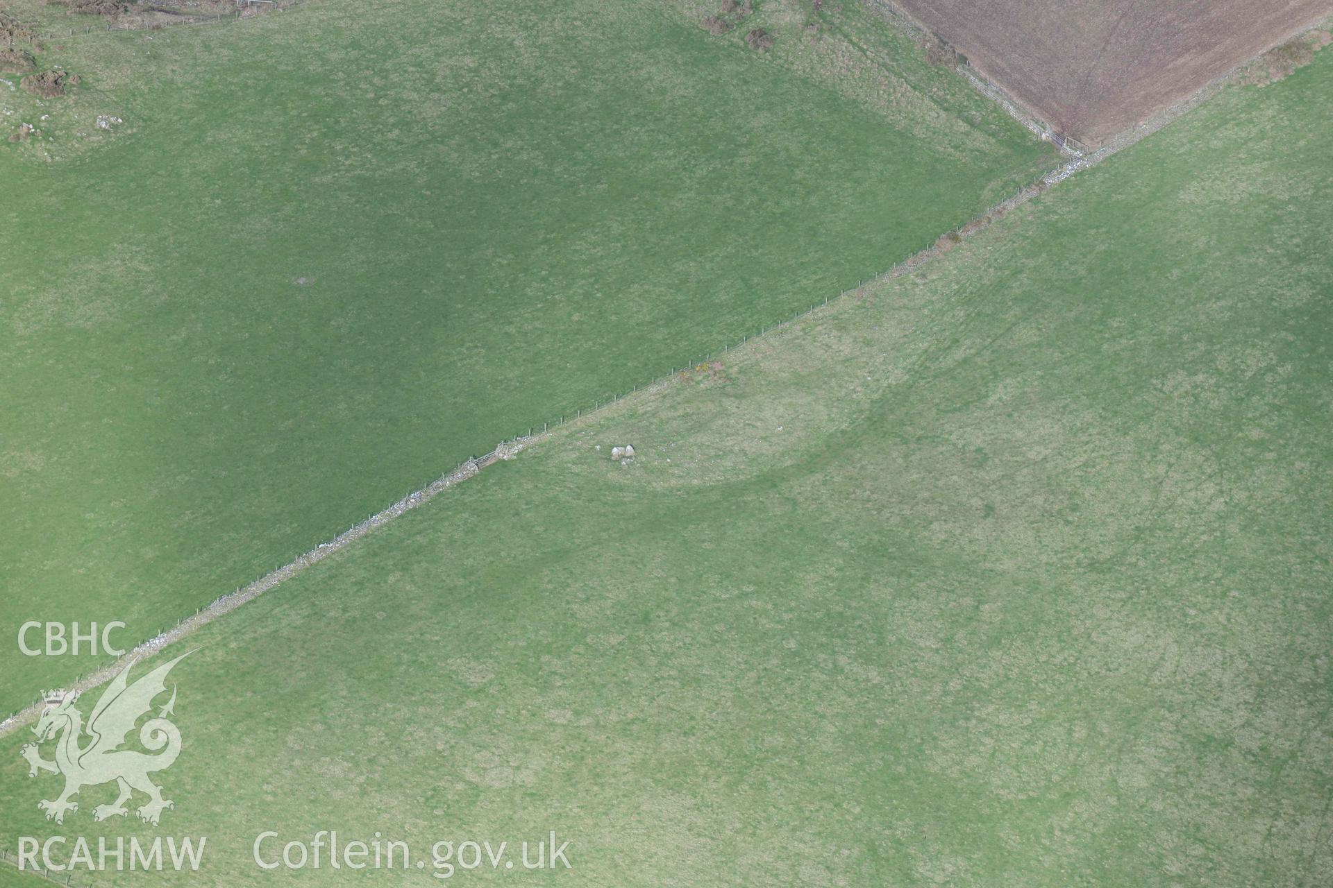 RCAHMW colour oblique aerial photograph of Lower Treginnis burial chamber taken on 4 March 2022 by Toby Driver ((SM717235)