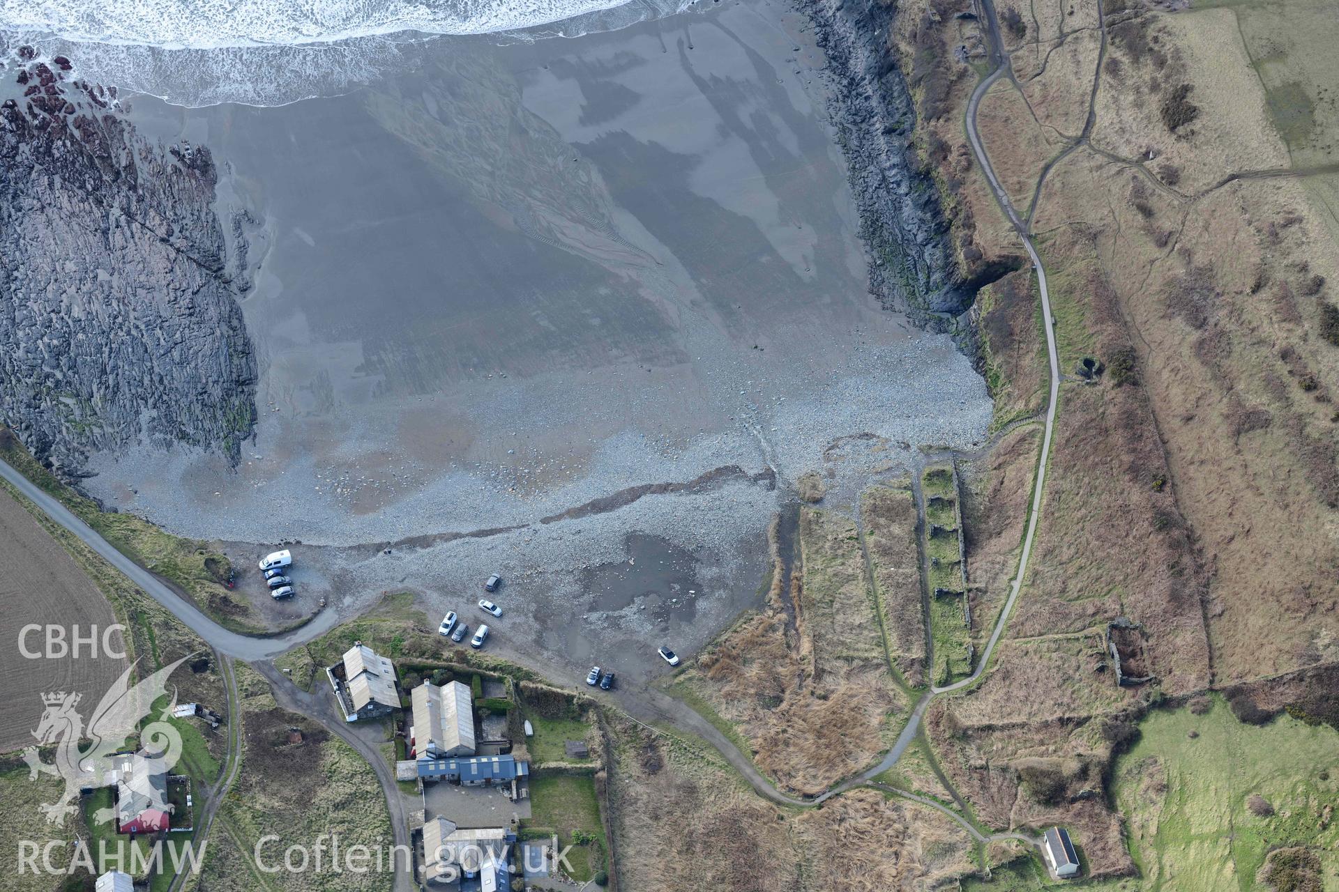 RCAHMW colour oblique aerial photograph of Porthgain terraced houseing, Abereiddi or Abereiddy Bay taken on 4 March 2022 by Toby Driver ((SM797313)