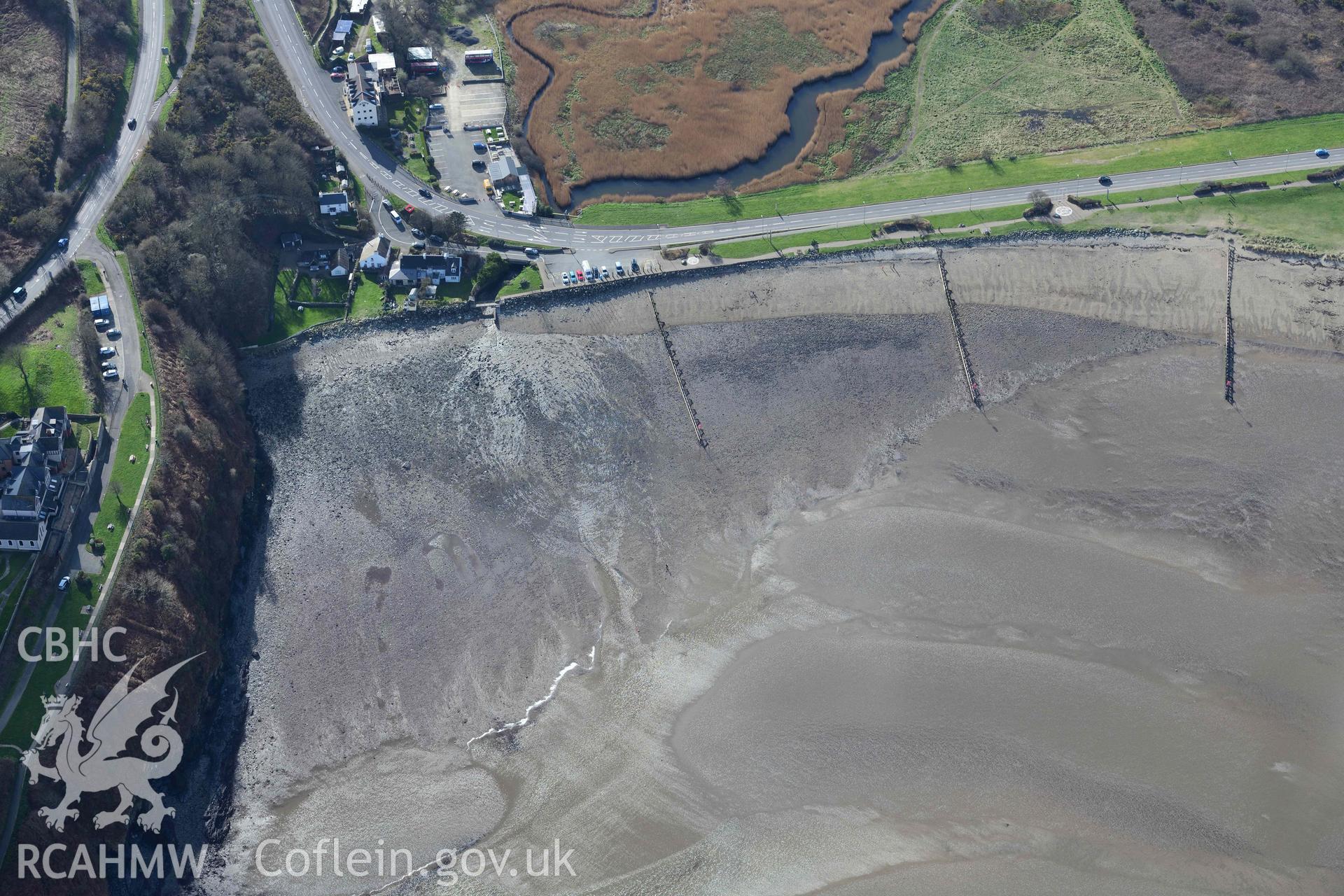 RCAHMW colour oblique aerial photograph of Fishguard harbour, site of wreck of Lizzie Edith taken on 4 March 2022 by Toby Driver ((SM951377)