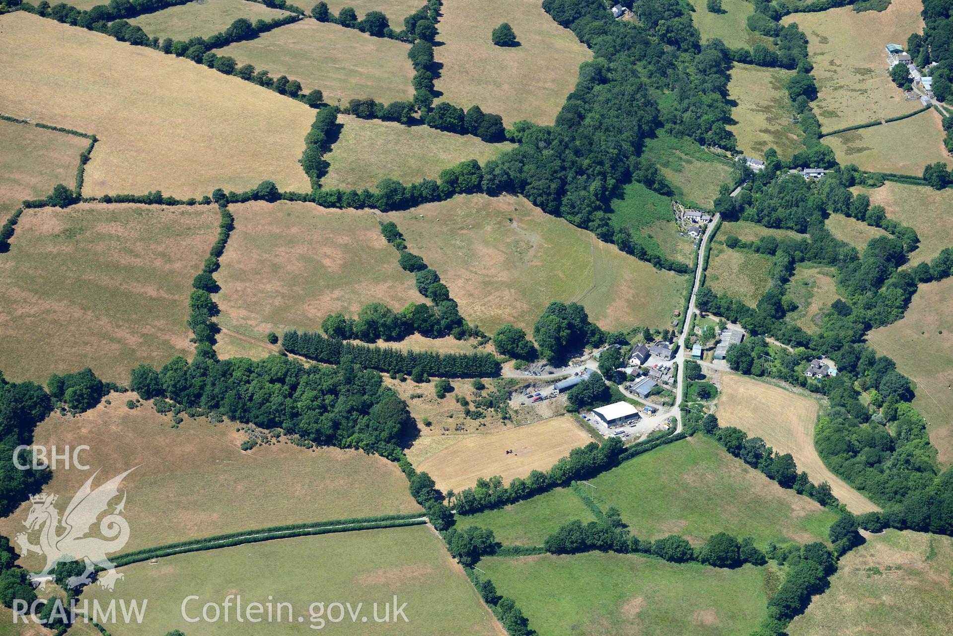 RCAHMW colour oblique aerial photograph of Aberhoffnant complex enclosure ( SN393402 ) taken on 9 July 2018 by Toby Driver