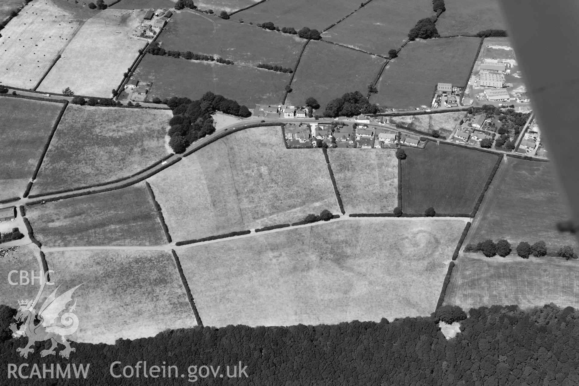 RCAHMW colour oblique aerial photograph of Llanllwni Roman Road and Llanllwni enclosure or watchtower taken on 9 July 2018 by Toby Driver