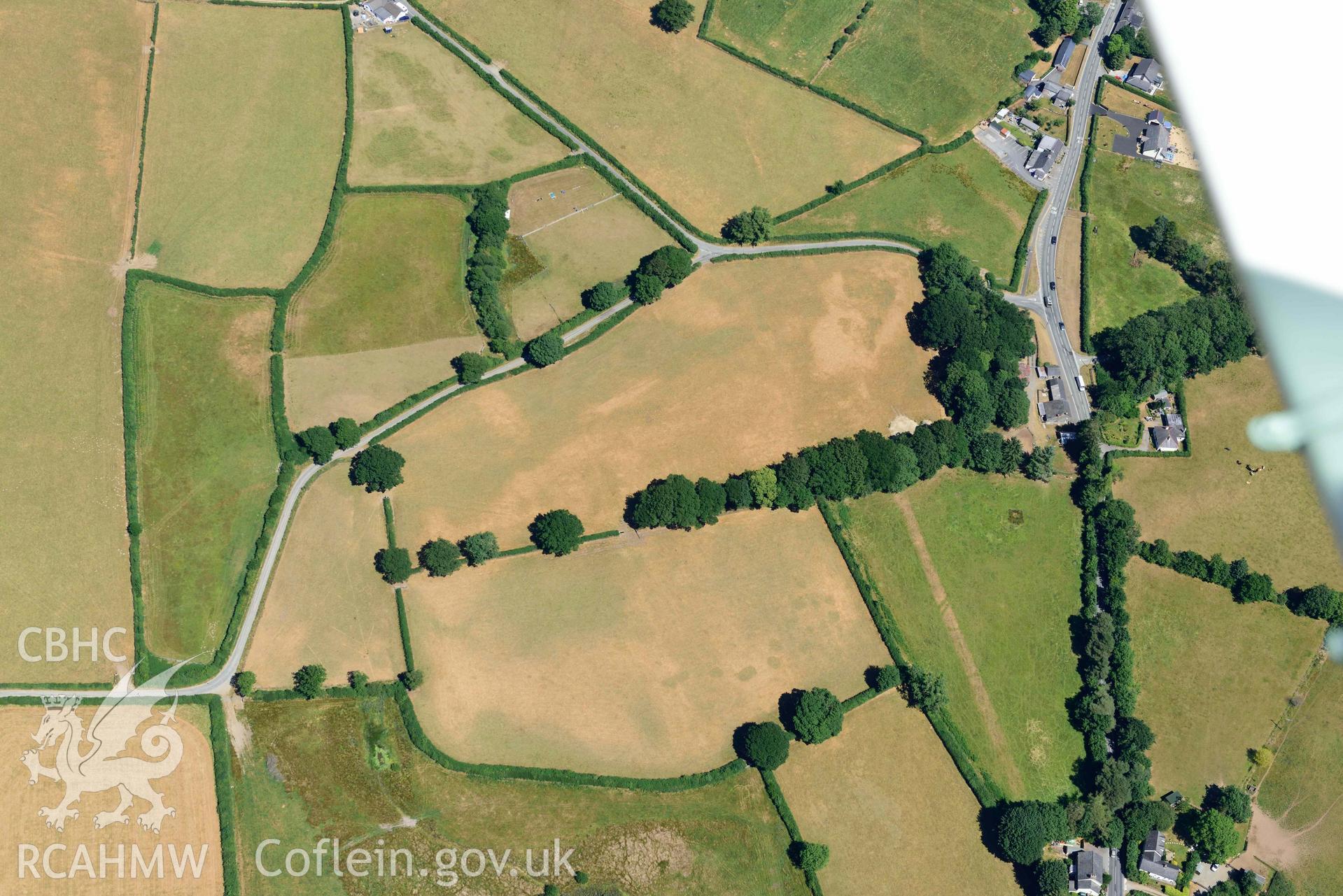 RCAHMW colour oblique aerial photograph of Aber Giar Roman Road and pits taken on 9 July 2018 by Toby Driver