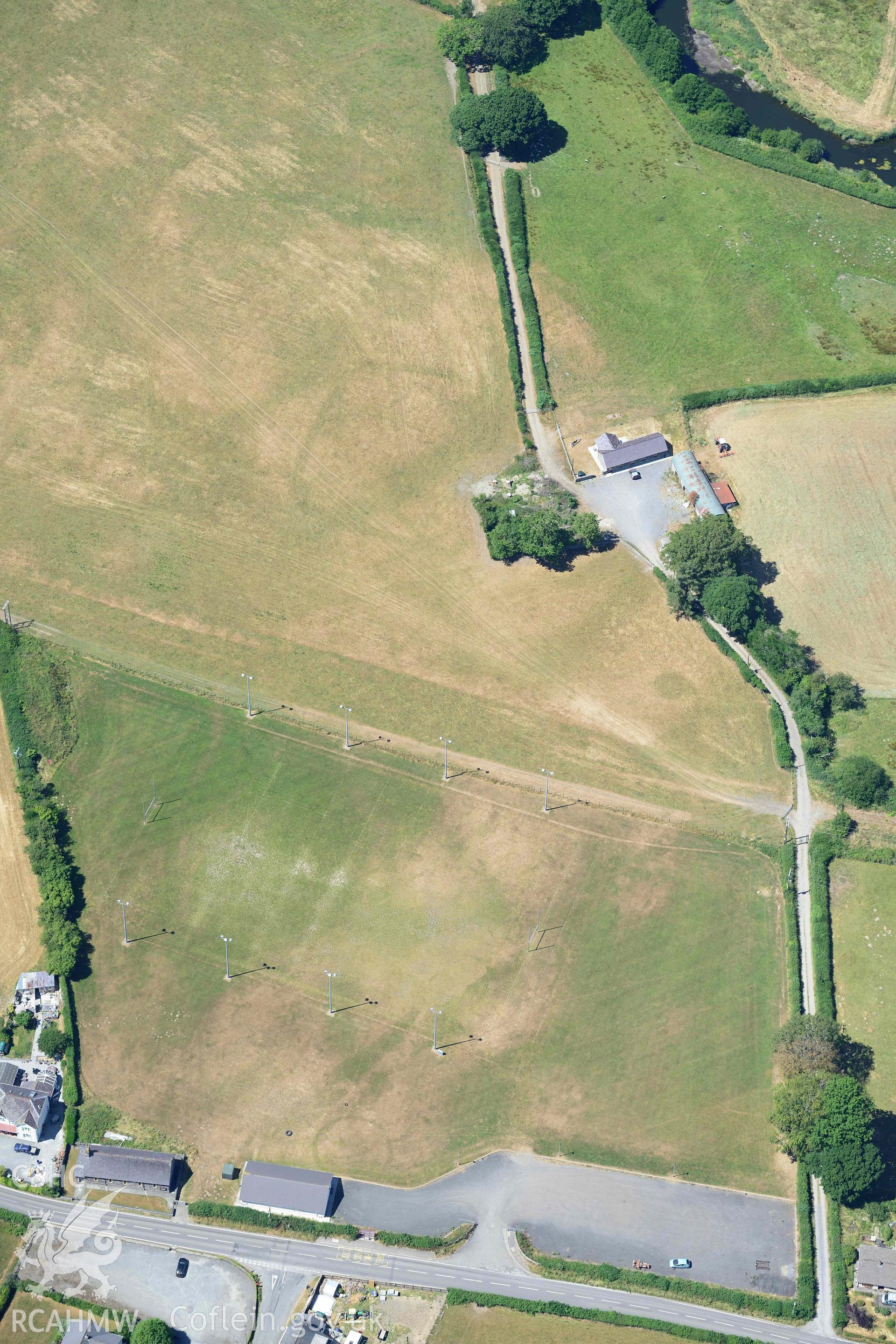 RCAHMW colour oblique aerial photograph of Cwmann rugby club ring ditches taken on 9 July 2018 by Toby Driver