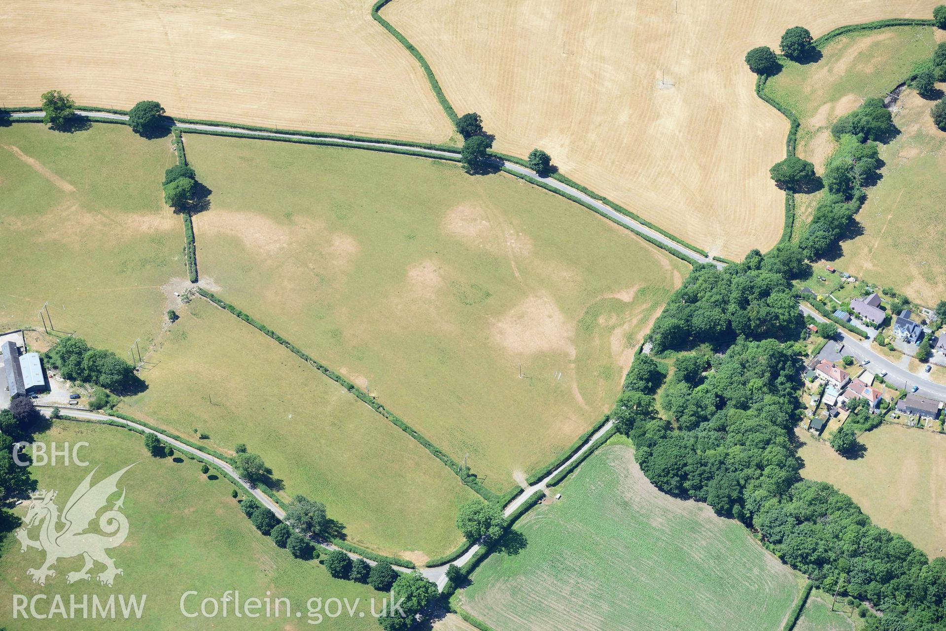 RCAHMW colour oblique aerial photograph of Pentre Llanfair Roman road and roadside settlement taken on 9 July 2018 by Toby Driver