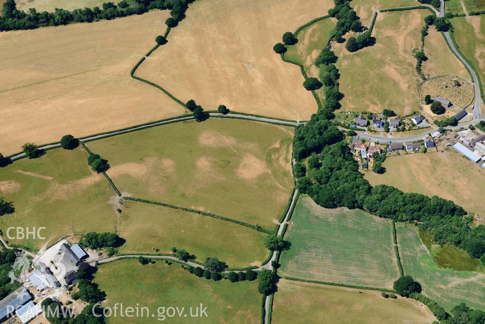 RCAHMW colour oblique aerial photograph of Pentre Llanfair Roman road and roadside settlement taken on 9 July 2018 by Toby Driver