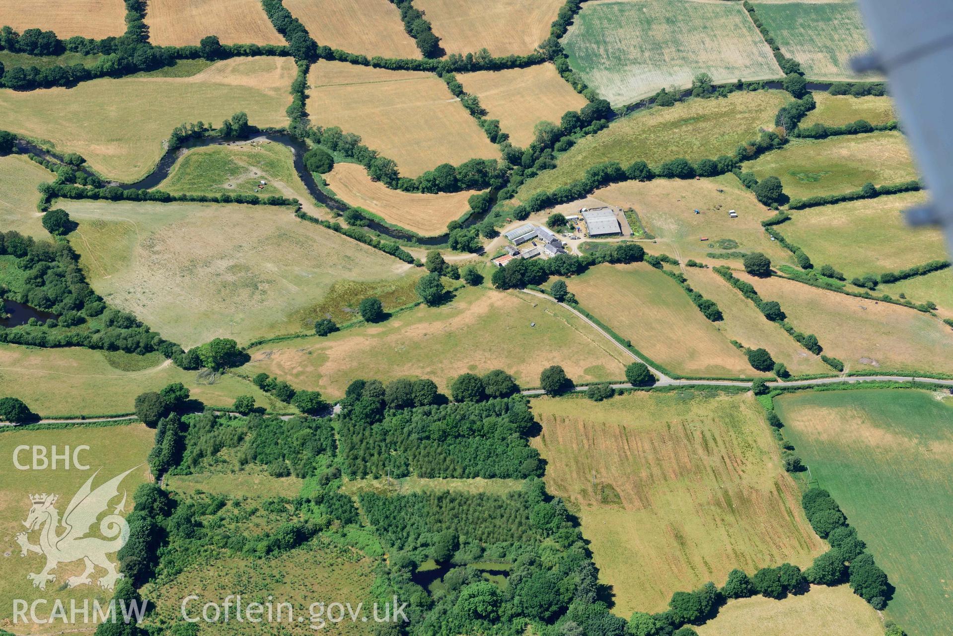 RCAHMW colour oblique aerial photograph of Pen-ddol Roman Road quarry pits ( SN 636529) taken on 9 July 2018 by Toby Driver