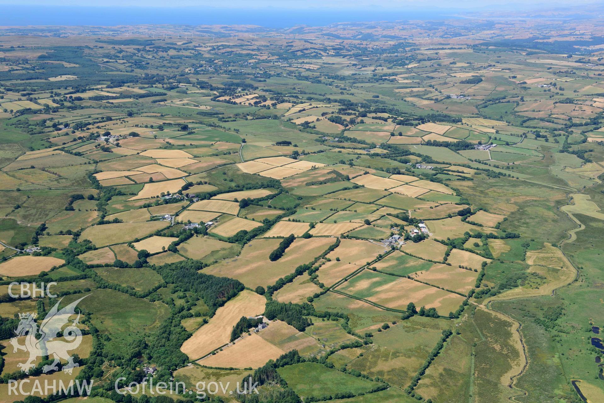 RCAHMW colour oblique aerial photograph of Fullbrook Tregaron and  Castell Llwyn Gwinau taken on 9 July 2018 by Toby Driver