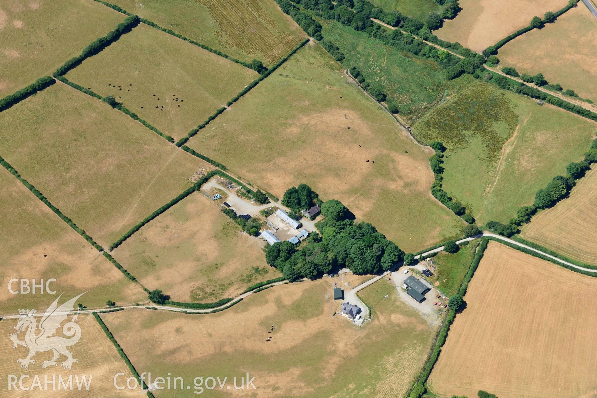 RCAHMW colour oblique aerial photograph of Maebandlog rectangular enclosure taken on 9 July 2018 by Toby Driver