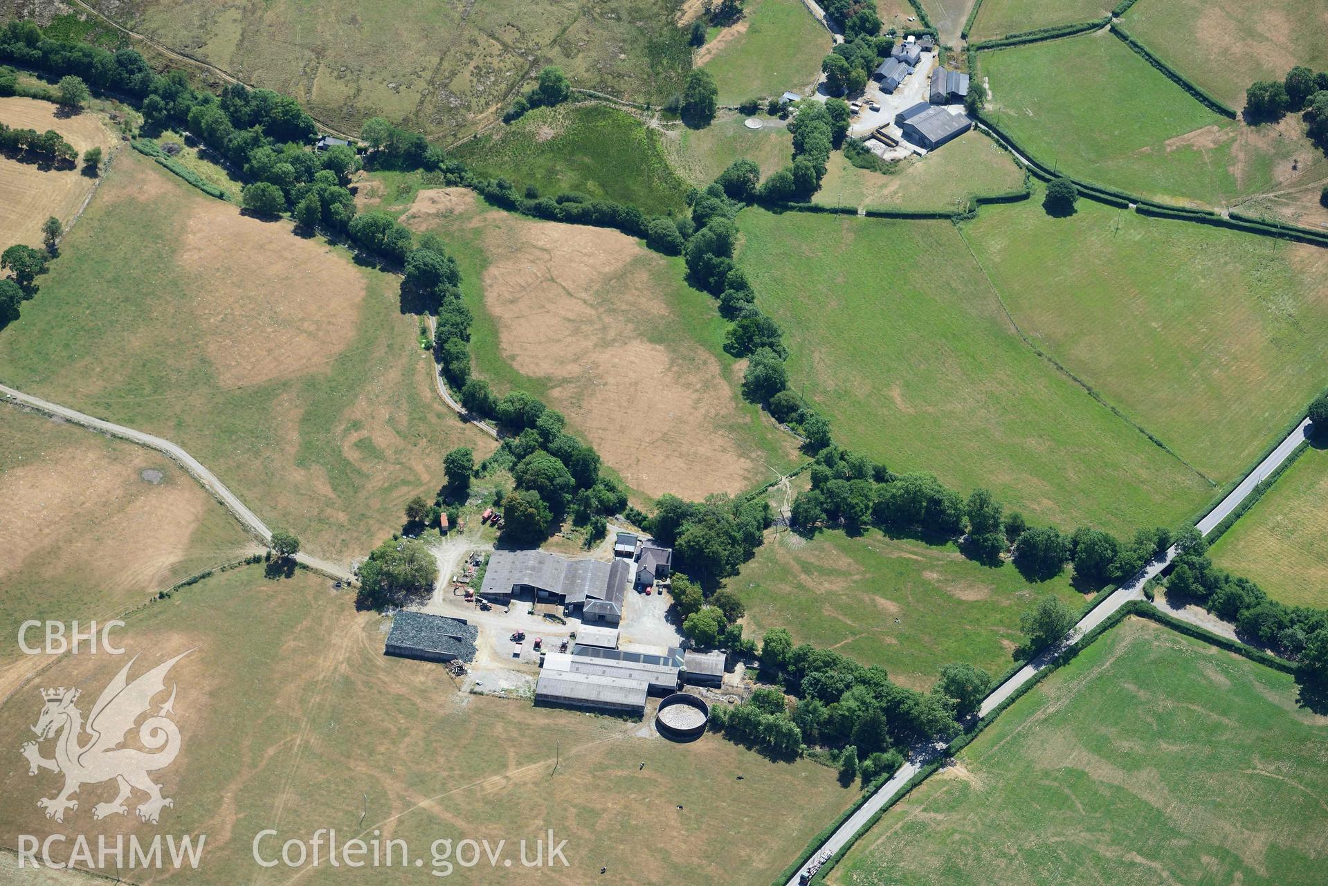 RCAHMW colour oblique aerial photograph of Old Abbey Farm 2 and Site of Hen Fynachlog taken on 9 July 2018 by Toby Driver