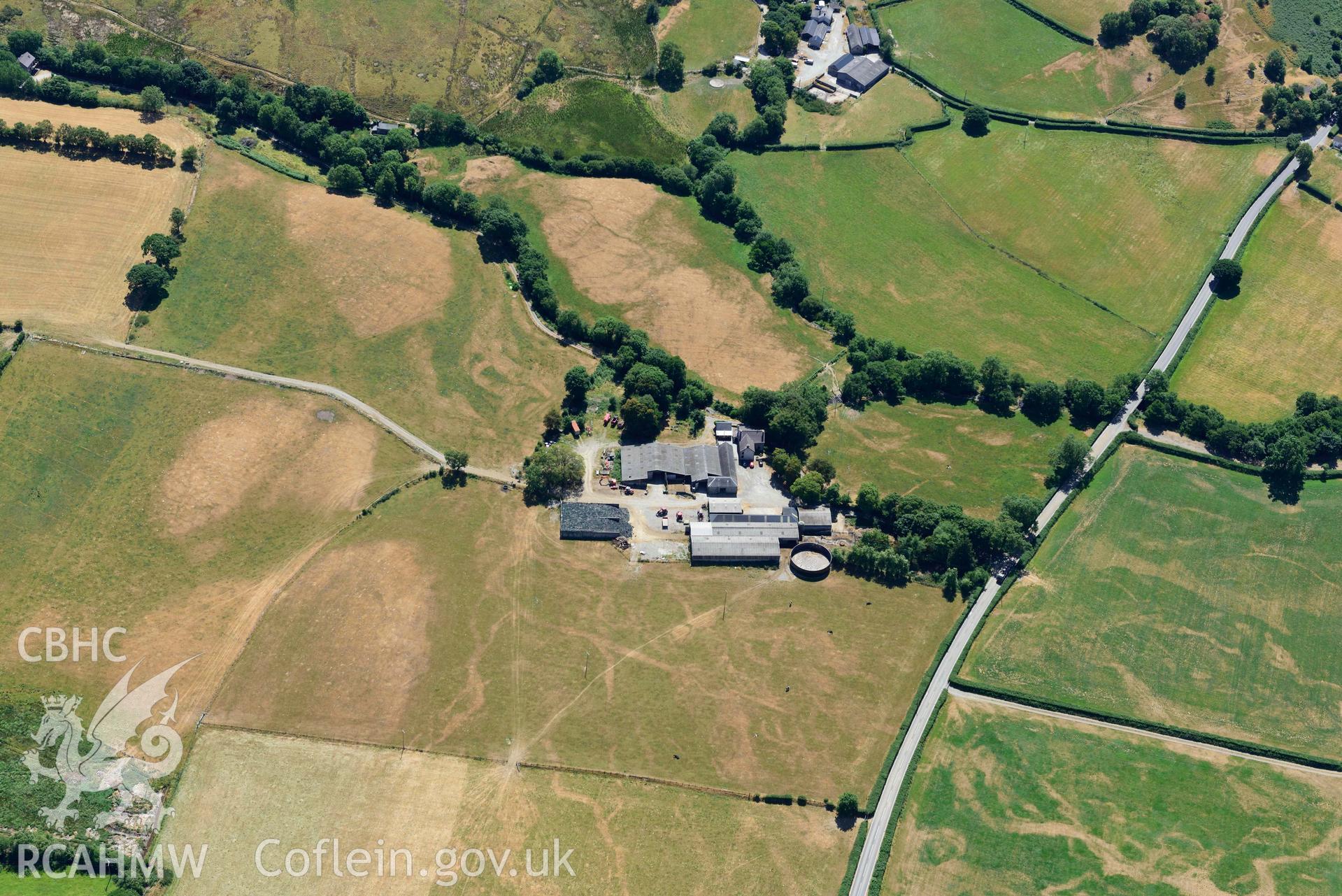 RCAHMW colour oblique aerial photograph of Old Abbey Farm 2 and Site of Hen Fynachlog taken on 9 July 2018 by Toby Driver