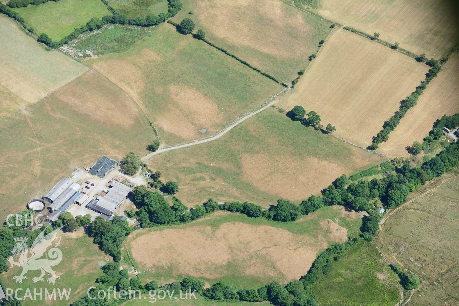 RCAHMW black and white oblique aerial photograph of Old Abbey Farm 2 and Site of Hen Fynachlog taken on 9 July 2018 by Toby Driver