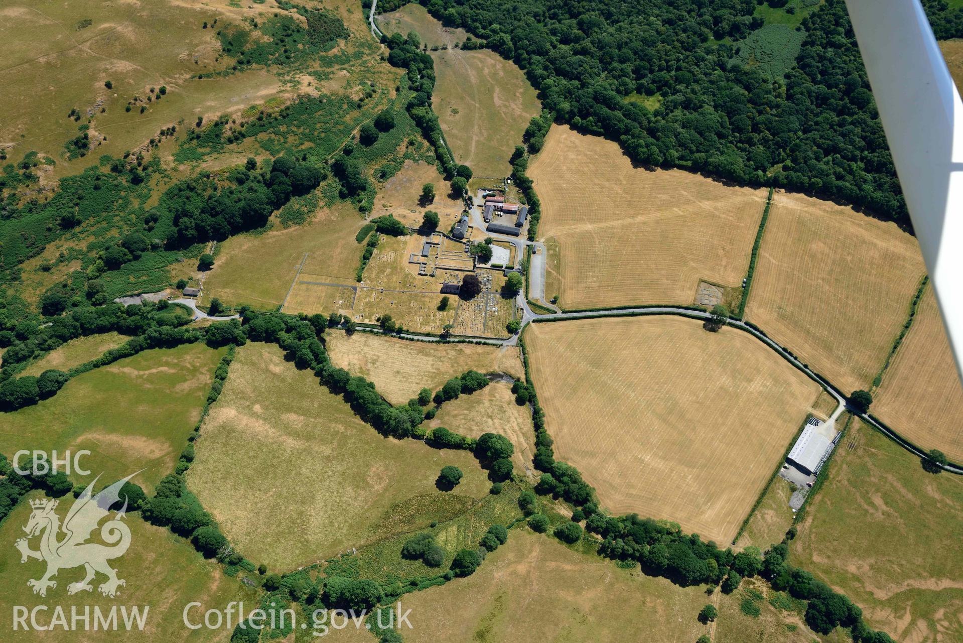 RCAHMW black and white oblique aerial photograph of Strata Florida Abbey taken on 9 July 2018 by Toby Driver