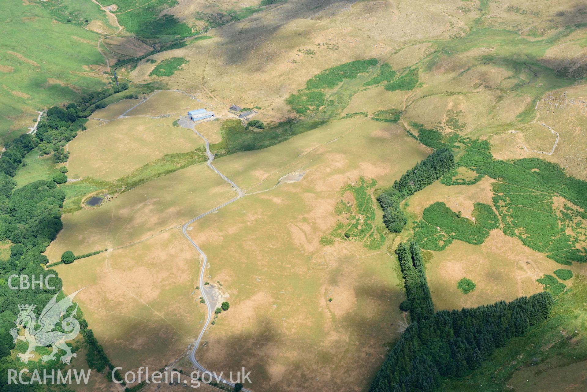 RCAHMW colour oblique aerial photograph of Penlandoppa farmstead parchmarks taken on 9 July 2018 by Toby Driver