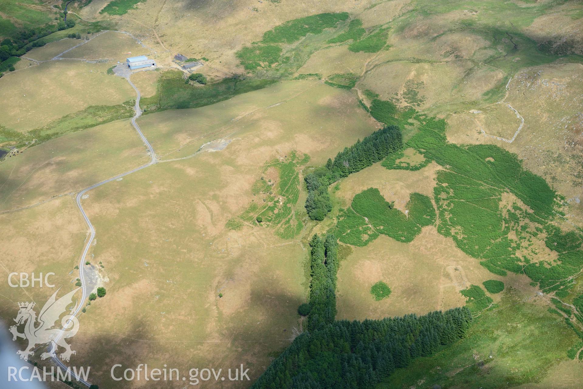 RCAHMW colour oblique aerial photograph of Penlandoppa farmstead parchmarks taken on 9 July 2018 by Toby Driver