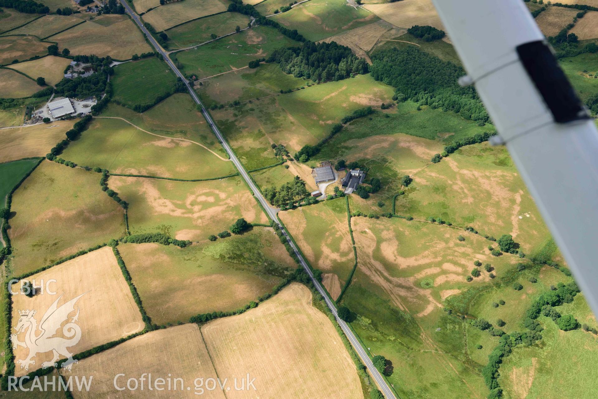 RCAHMW colour oblique aerial photograph of Elan aqueduct parchmarks at Dulas taken on 9 July 2018 by Toby Driver