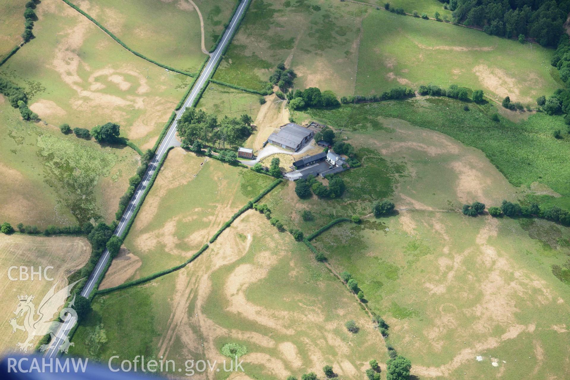 RCAHMW colour oblique aerial photograph of Elan aqueduct parchmarks at Dulas and Daverneithen circular structure taken on 9 July 2018 by Toby Driver