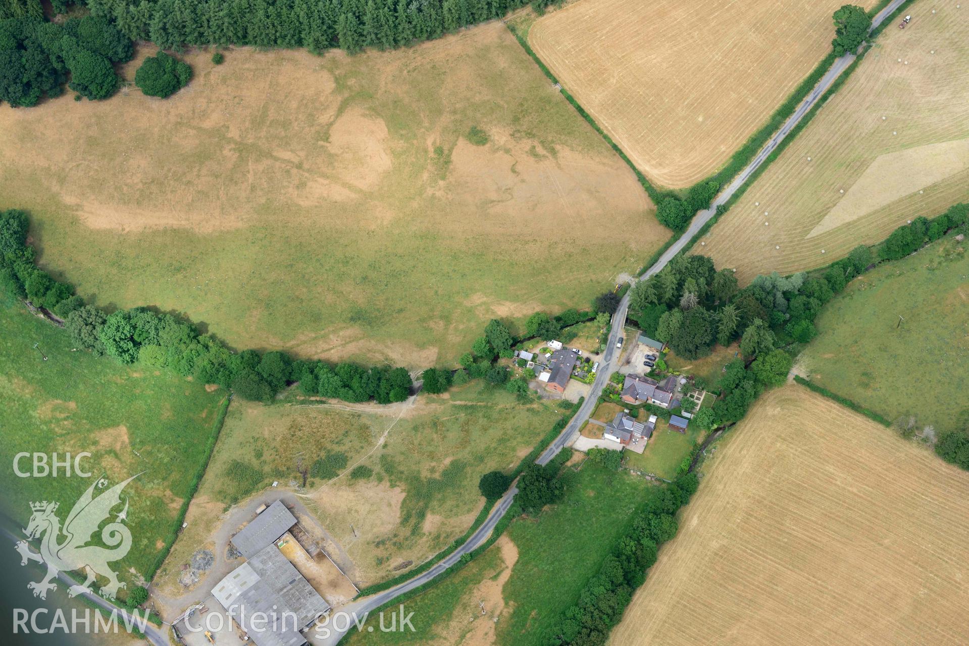 RCAHMW colour oblique aerial photograph of Wenallt Barn enclosures taken on 9 July 2018 by Toby Driver