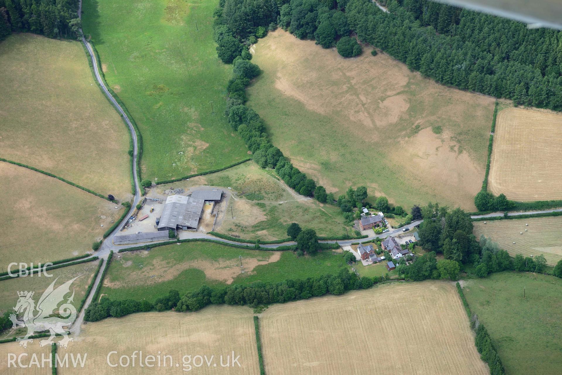 RCAHMW colour oblique aerial photograph of Wenallt Barn enclosures taken on 9 July 2018 by Toby Driver