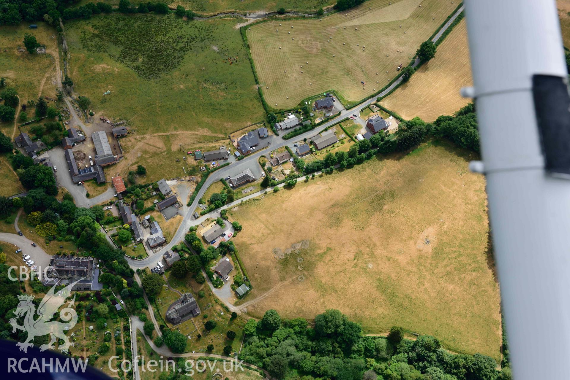 RCAHMW colour oblique aerial photograph of Abbey Cwmhir burial ground taken on 9 July 2018 by Toby Driver