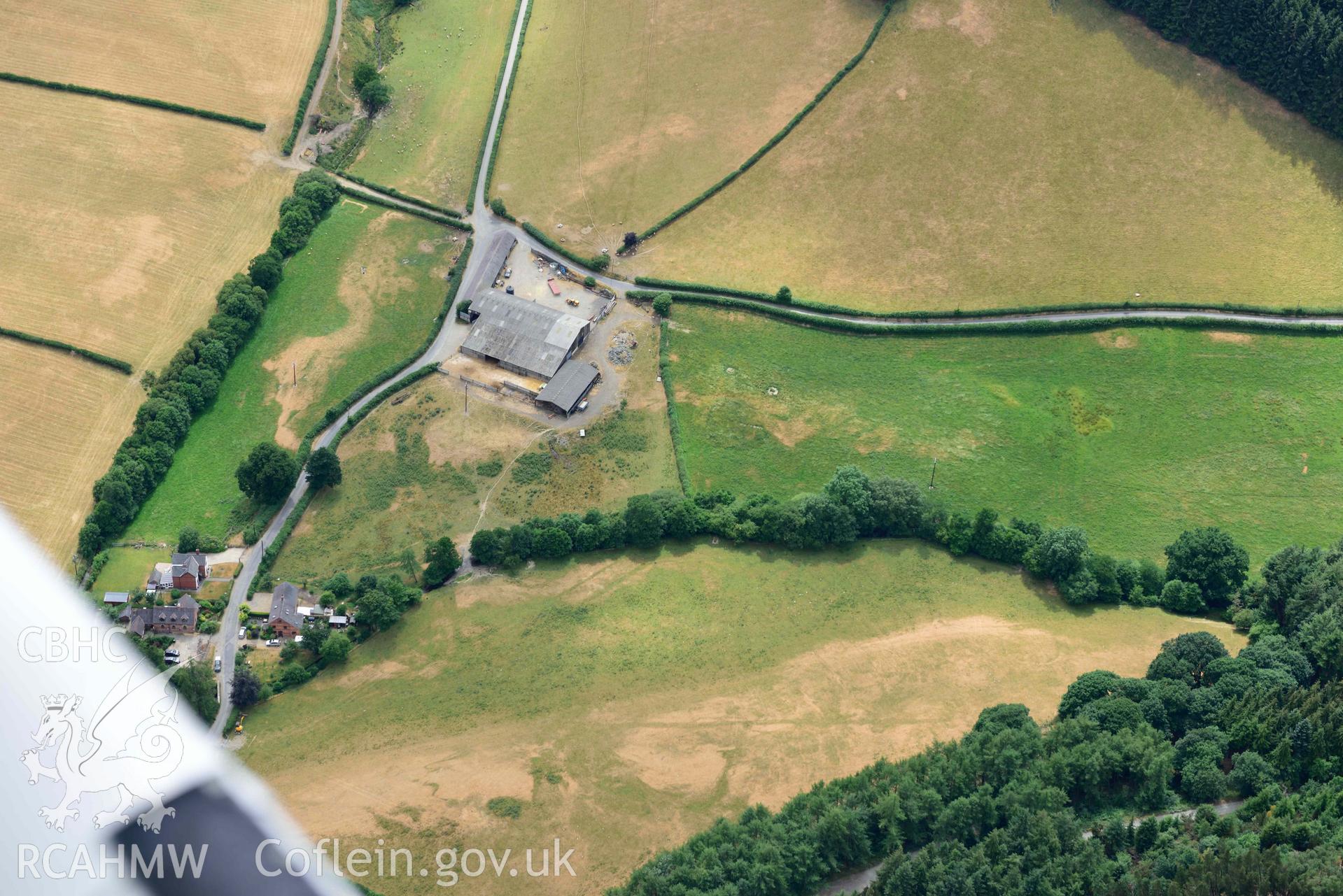 RCAHMW colour oblique aerial photograph of Wenallt Barn enclosures taken on 9 July 2018 by Toby Driver