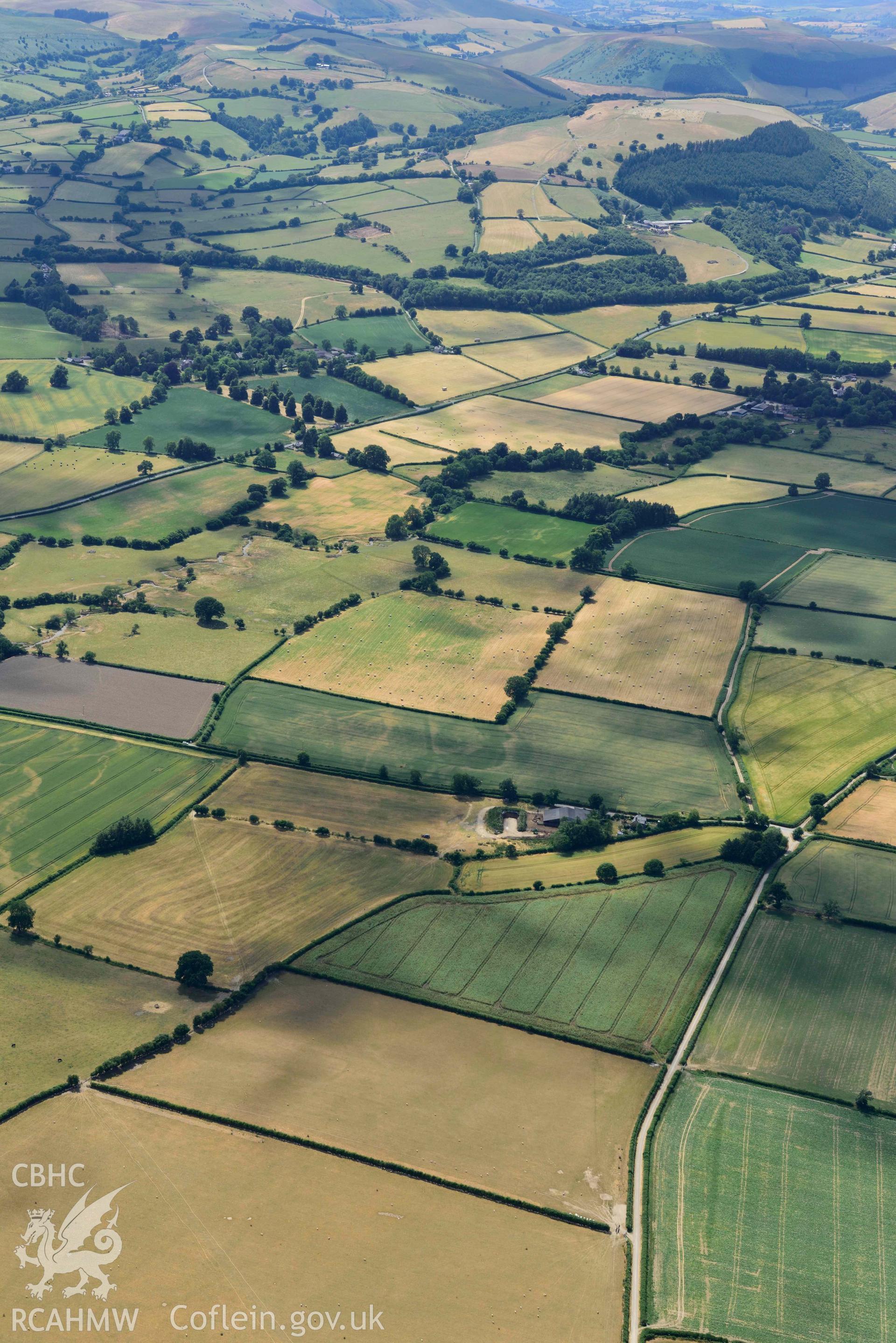 RCAHMW black and white oblique aerial photograph of Hindwell Cursus at Four Stones taken on 9 July 2018 by Toby Driver