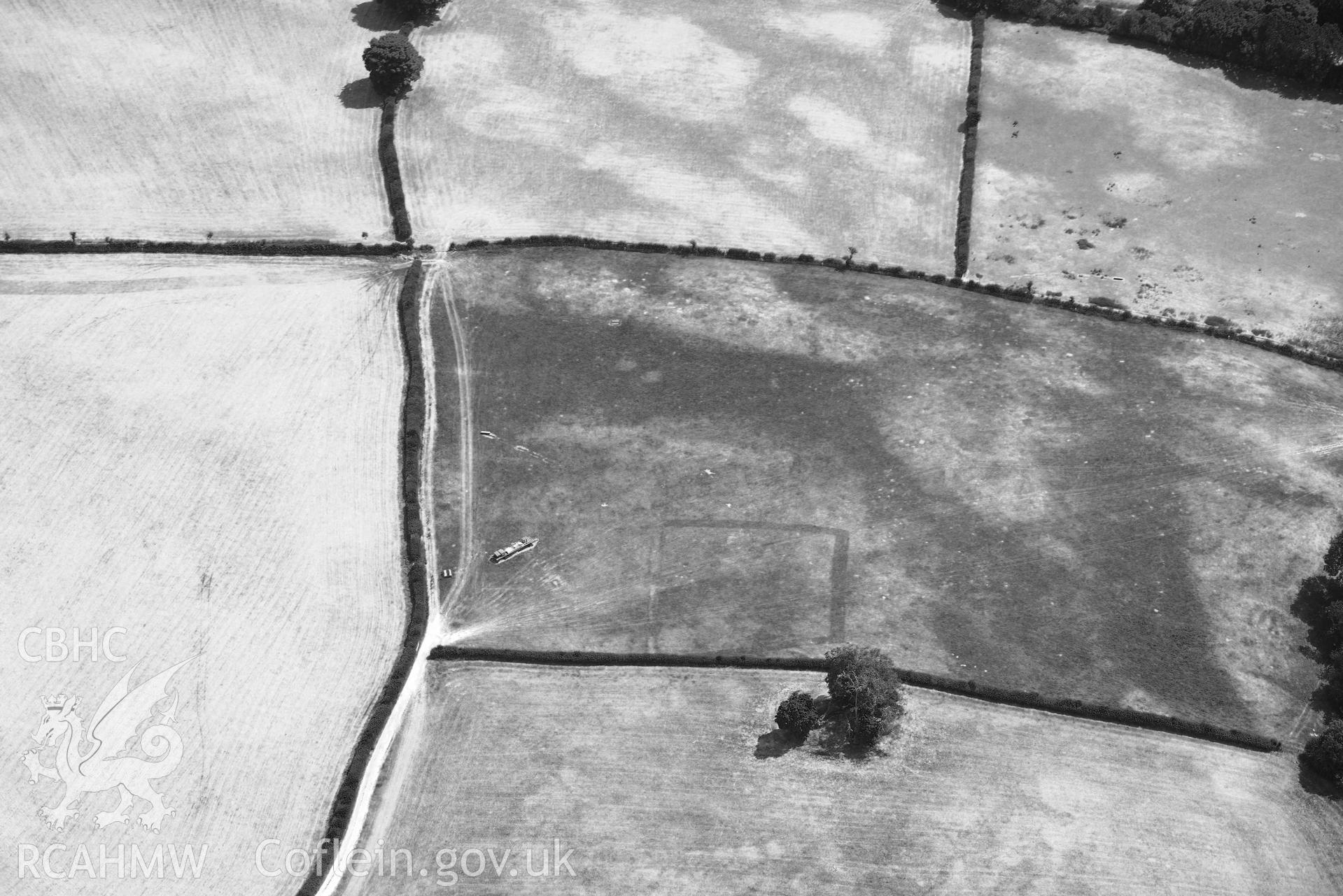 RCAHMW colour oblique aerial photograph of Abersefin cropmark enclosure taken on 9 July 2018 by Toby Driver