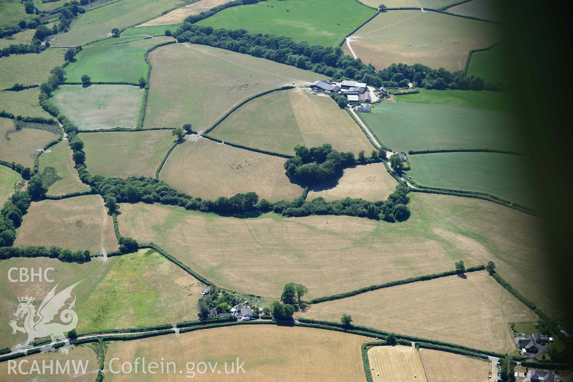 RCAHMW colour oblique aerial photograph of  St Cannas enclosure complex taken on 9 July 2018 by Toby Driver