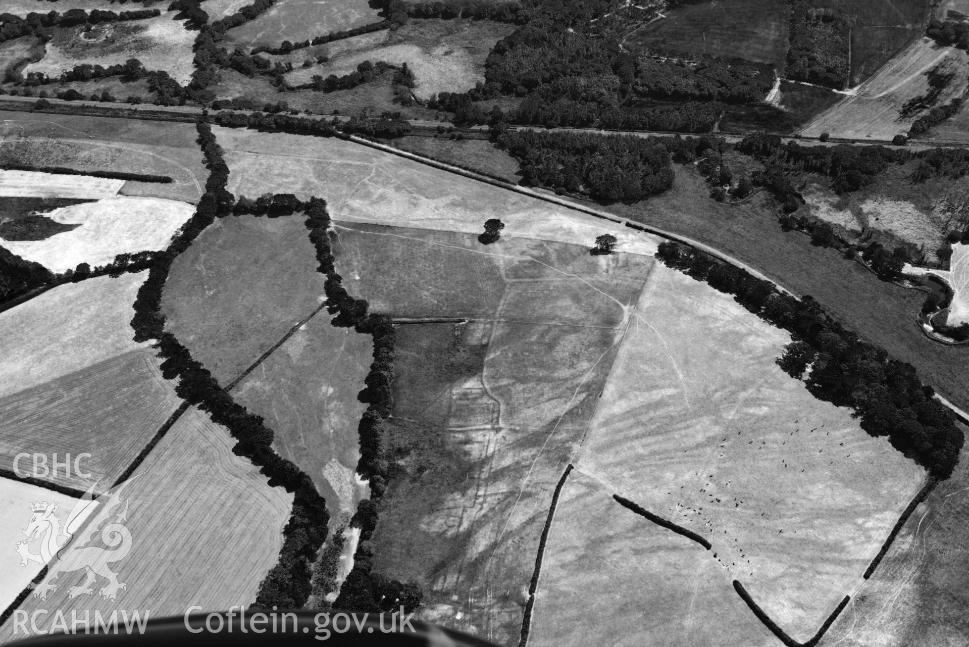 RCAHMW colour oblique aerial photograph of Cefnfarchen deserted medieval settlement taken on 9 July 2018 by Toby Driver