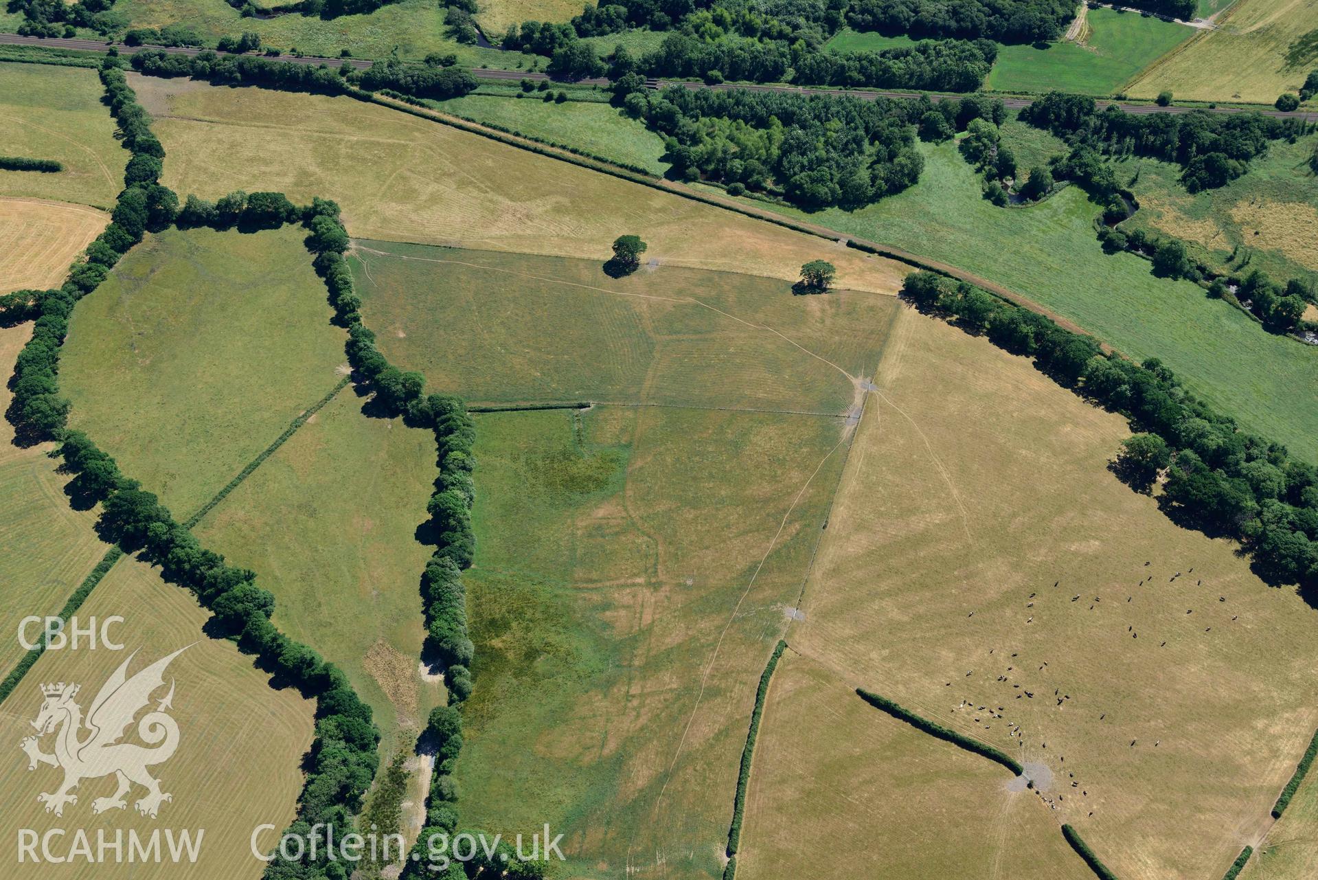 RCAHMW colour oblique aerial photograph of Cefnfarchen deserted medieval settlement taken on 9 July 2018 by Toby Driver