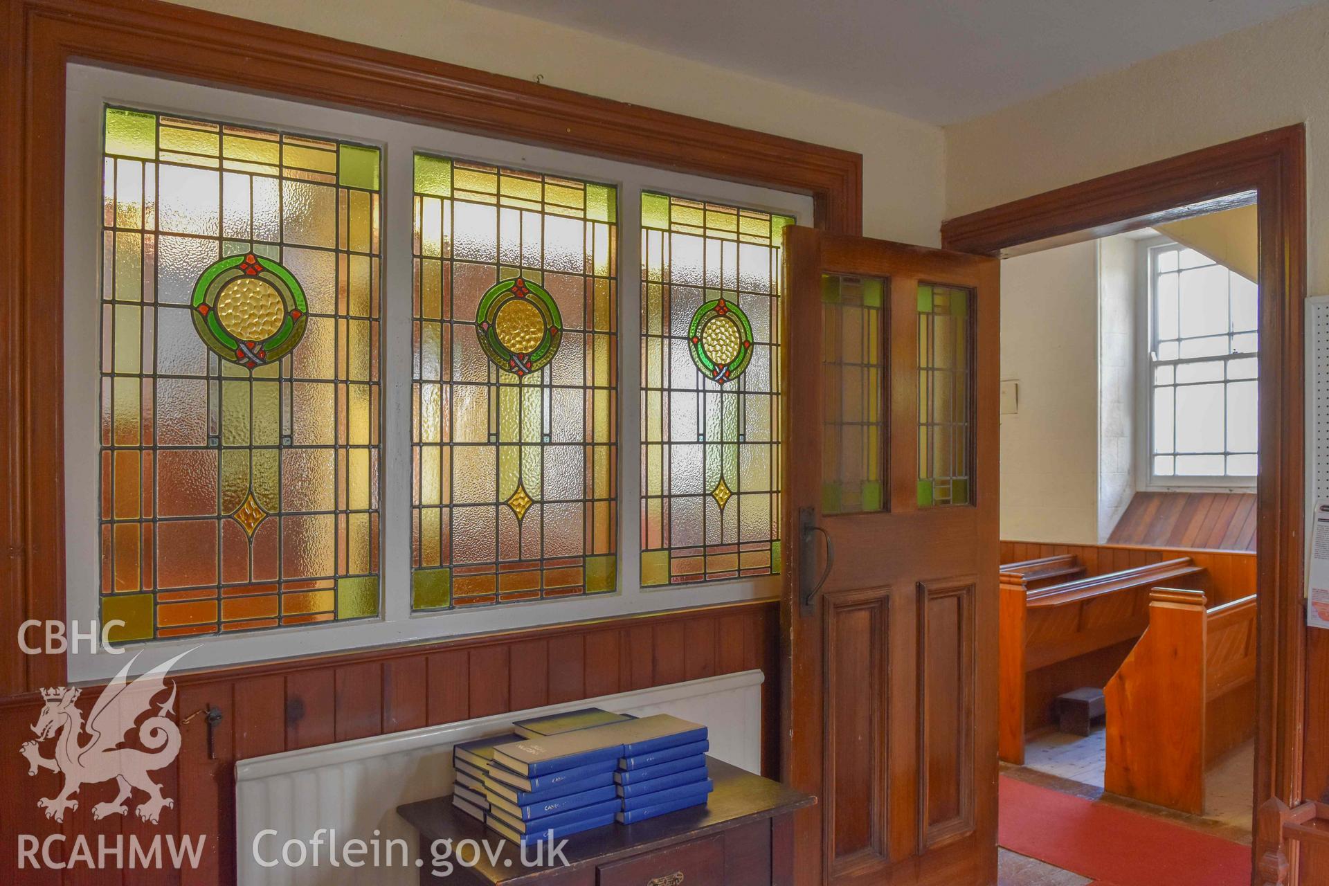 Judah Welsh Baptist Church - View of a door and stained glass window in the vestibule, taken from South-East