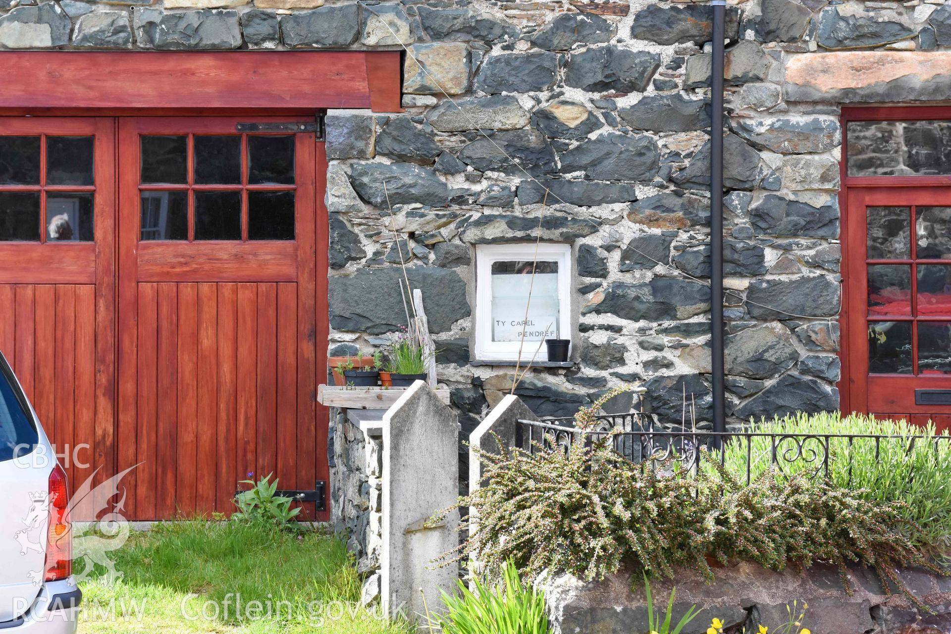 Pendref Wesleyan Methodist Sunday School - Detailed view of a portion of the front of the schoolhouse showing a sign reading 'Ty Capel, Pendref', taken from East