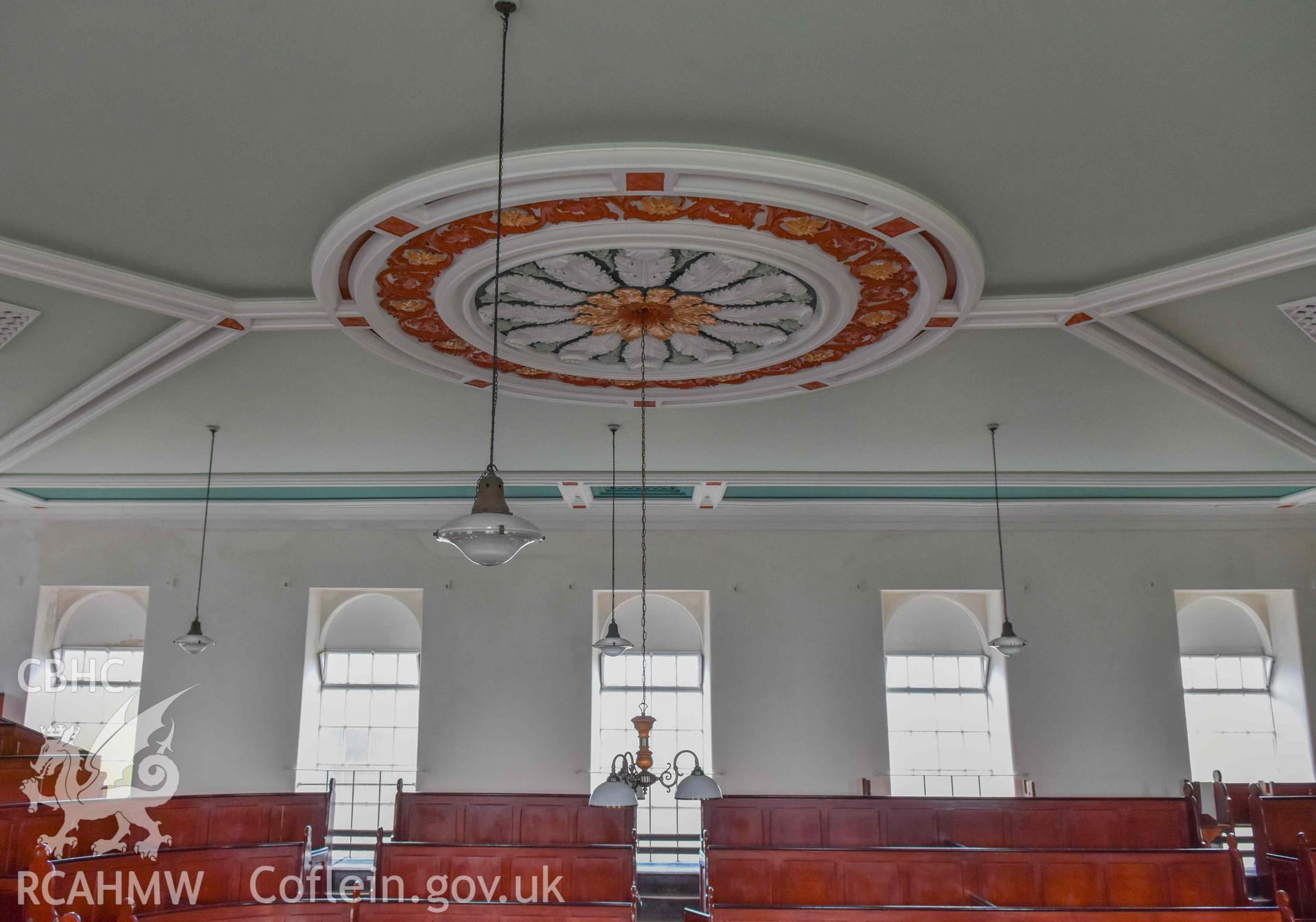 Tabernacl Welsh Independent Chapel - View of lighting hanging from the chapel's ceiling, taken from East