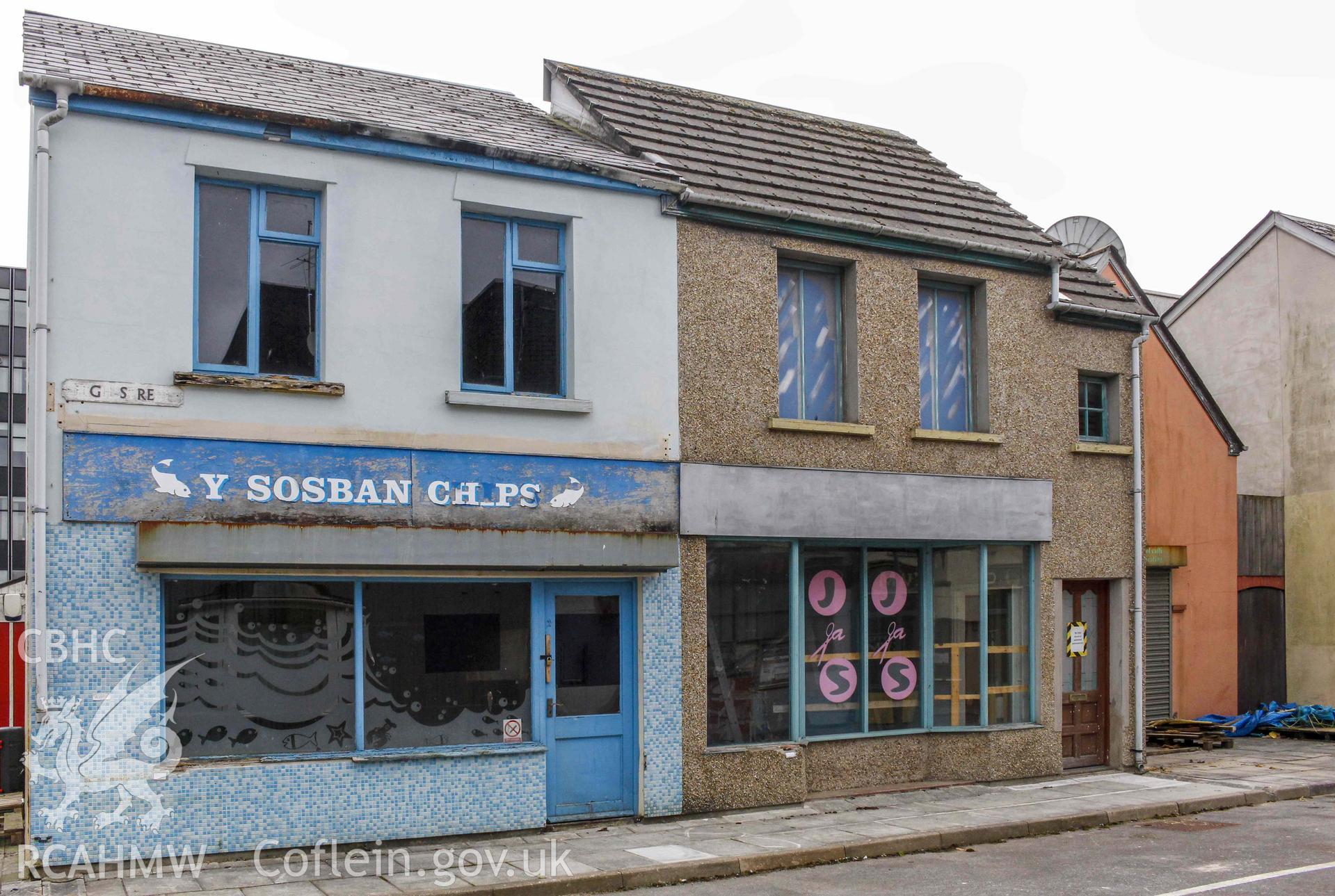 Pobl Y Cwm Set - Exterior, View of Y Sosban Chips, the hairdresser and the additional café seating garage, taken from North