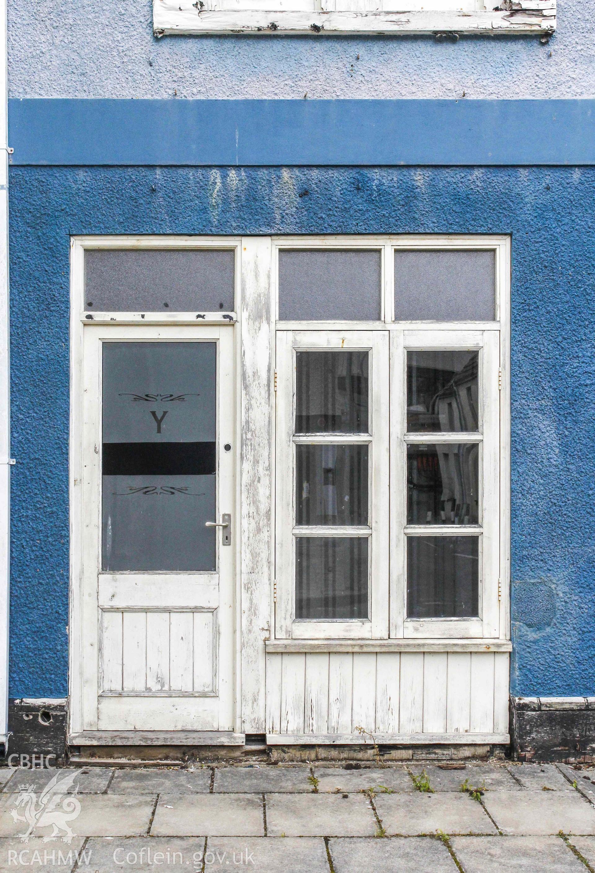 Pobl Y Cwm Set - Exterior, Detailed view of a door to Y Deri Arms, taken from South-West