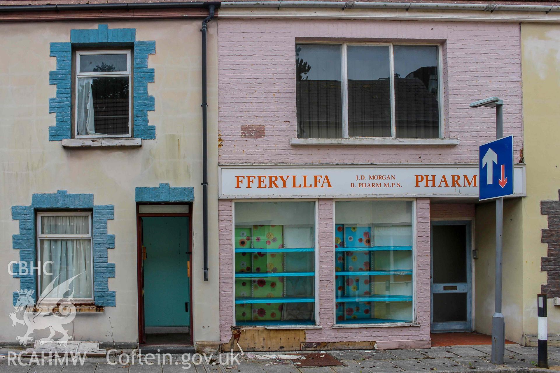 Pobl Y Cwm Set - Exterior, View of the pharmacy and an adjacent house on High Street, taken from South-East