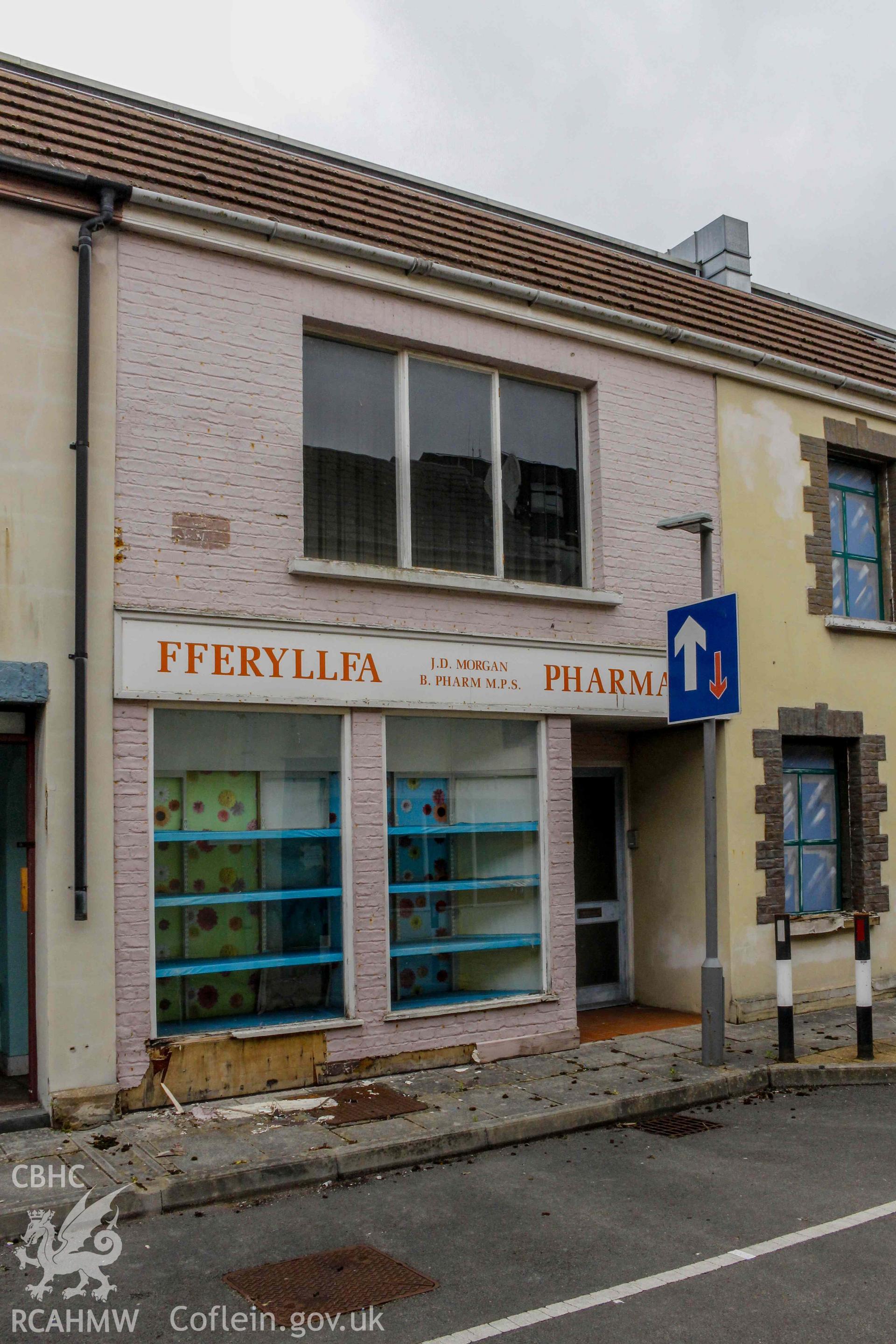 Pobl Y Cwm Set - Exterior, View of the pharmacy and adjacent houses on High Street, taken from South
