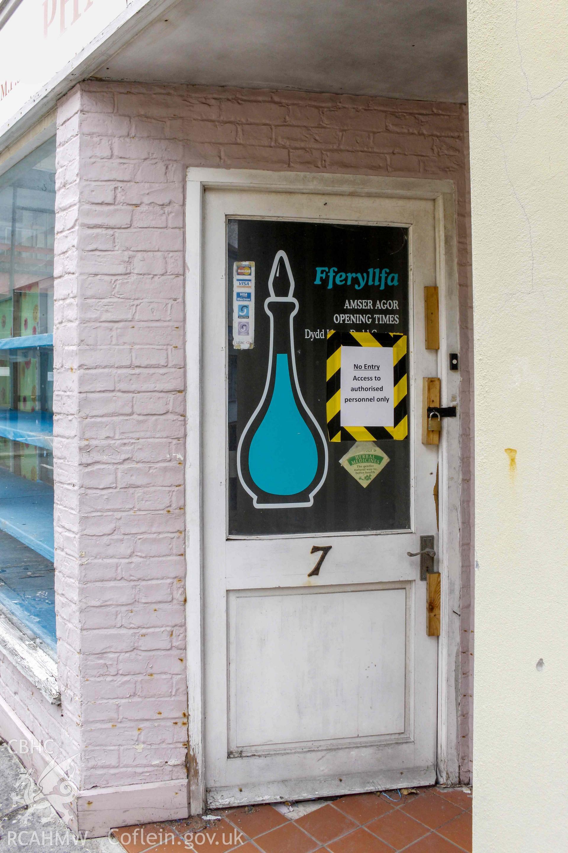 Pobl Y Cwm Set - Exterior, View of the entrance to the pharmacy on High Street, taken from North-East