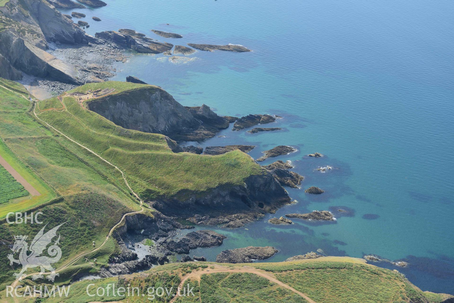 Porth y Rhaw coastal promontory fort, with excavations in progress by the Dyfed Archaeological Trust. © Crown: CHERISH PROJECT 2017. Produced with EU funds through the Ireland Wales Co-operation Programme 2014-2023.