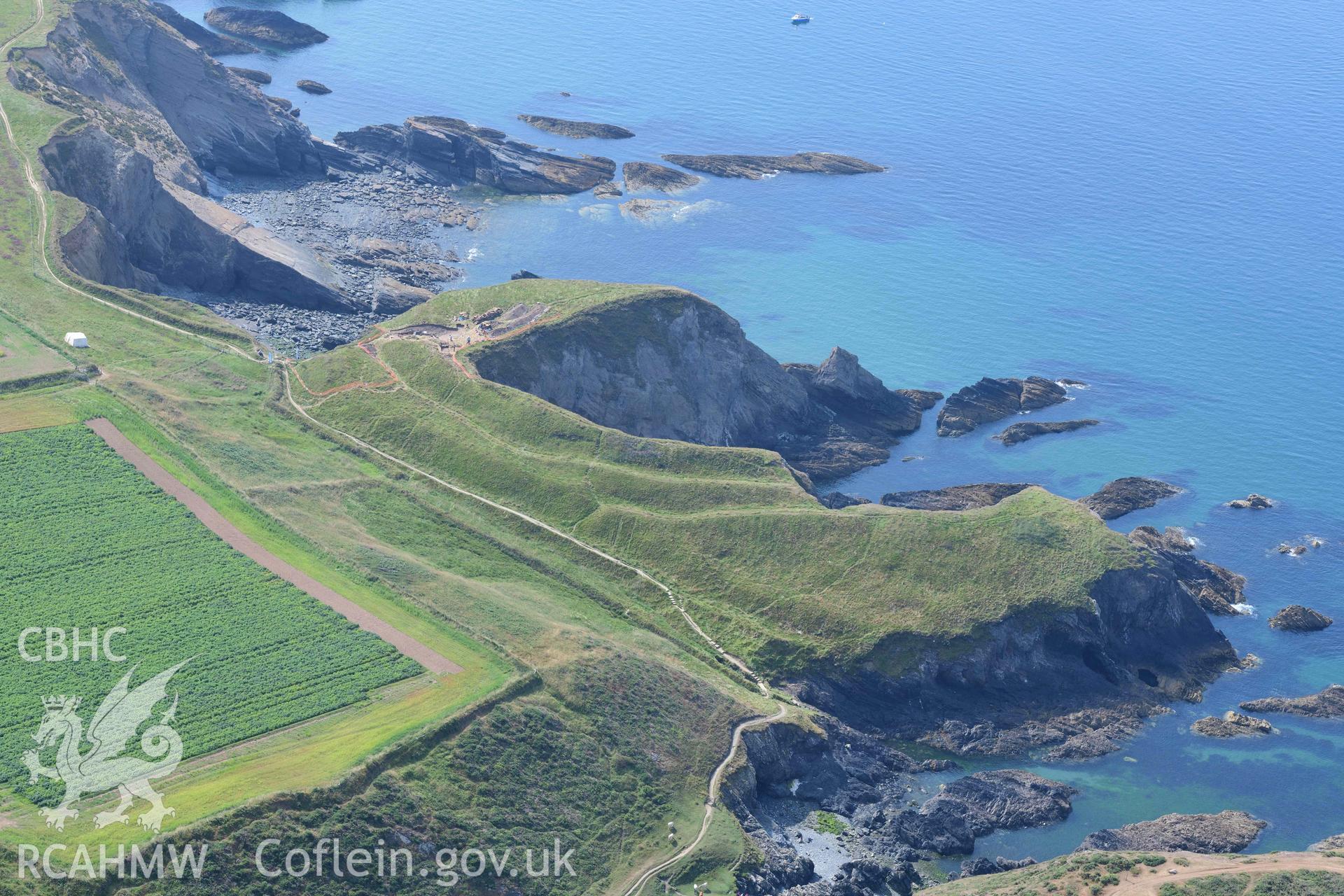 Porth y Rhaw coastal promontory fort, with excavations in progress by the Dyfed Archaeological Trust. © Crown: CHERISH PROJECT 2017. Produced with EU funds through the Ireland Wales Co-operation Programme 2014-2023.
