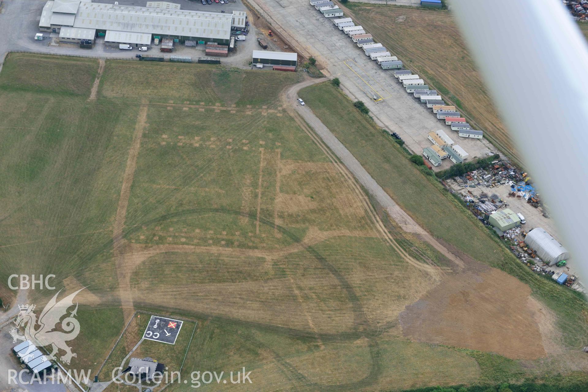 Aerial photography of Carew Cheriton and Milton Airship station Aerial reconnaissance survey for the CHERISH Project. Crown Copyright: CHERISH PROJECT 2018. Produced with EU funds through the Ireland Wales Co-operation Programme 2014-2020. All material made freely available through the Open Government Licence.